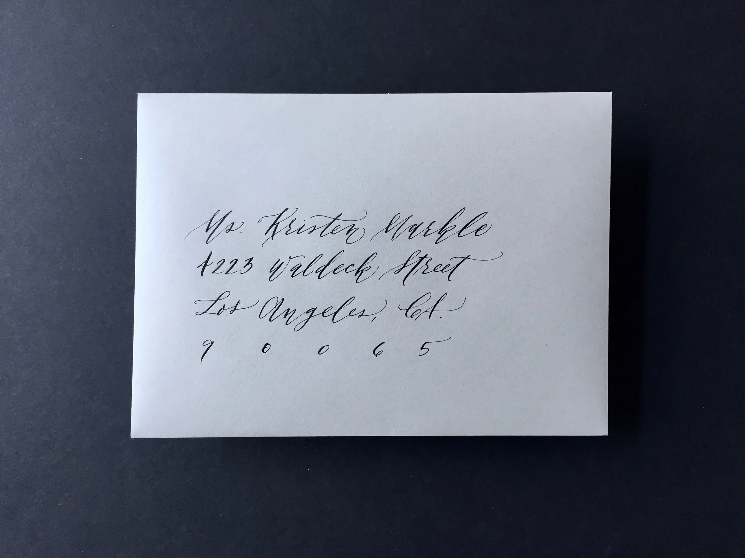 tigerfloss-black-calligraphy-gray-envelope.jpg