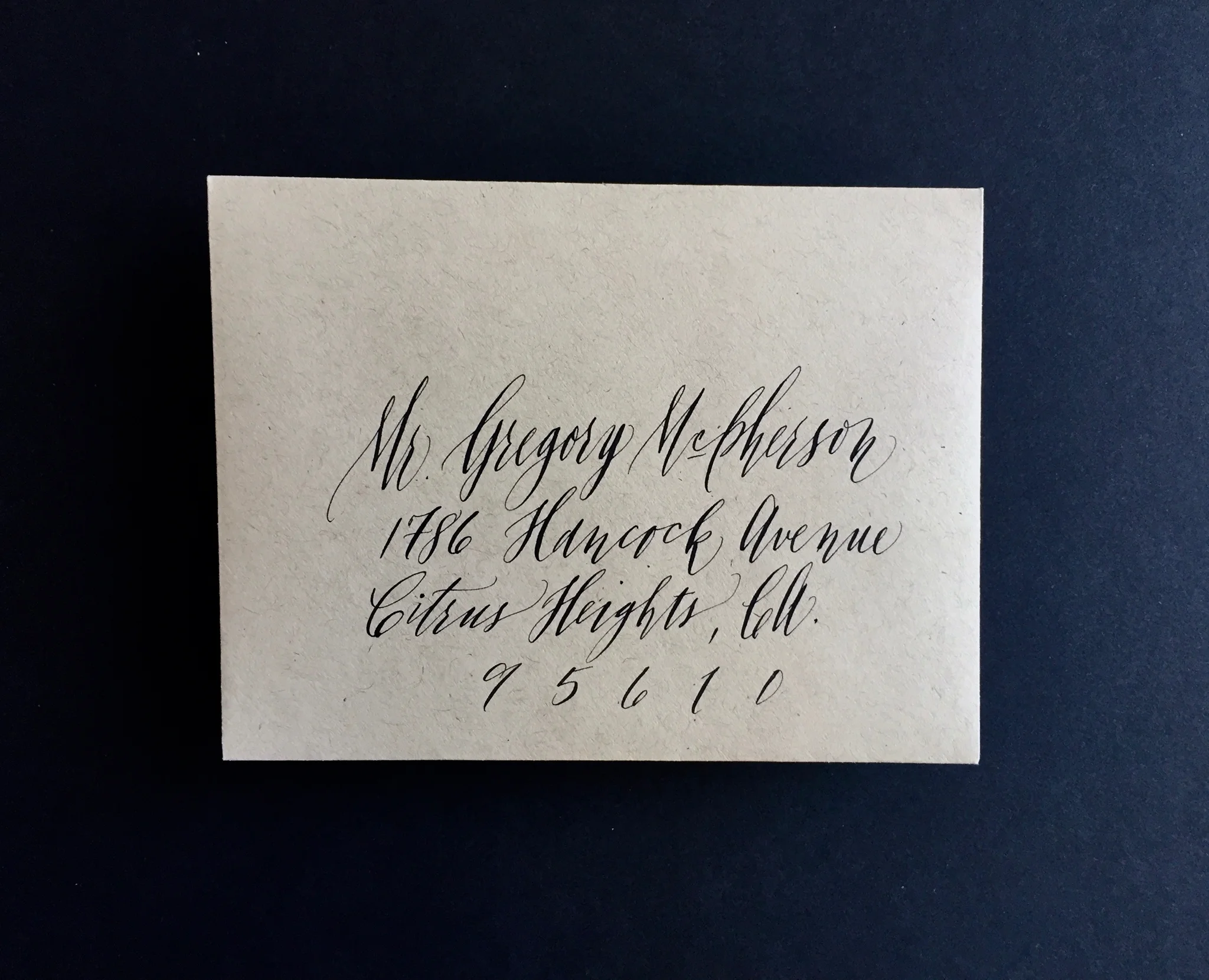 tigerfloss-black-ink-calligraphy-kraft envelope-stilts.jpg