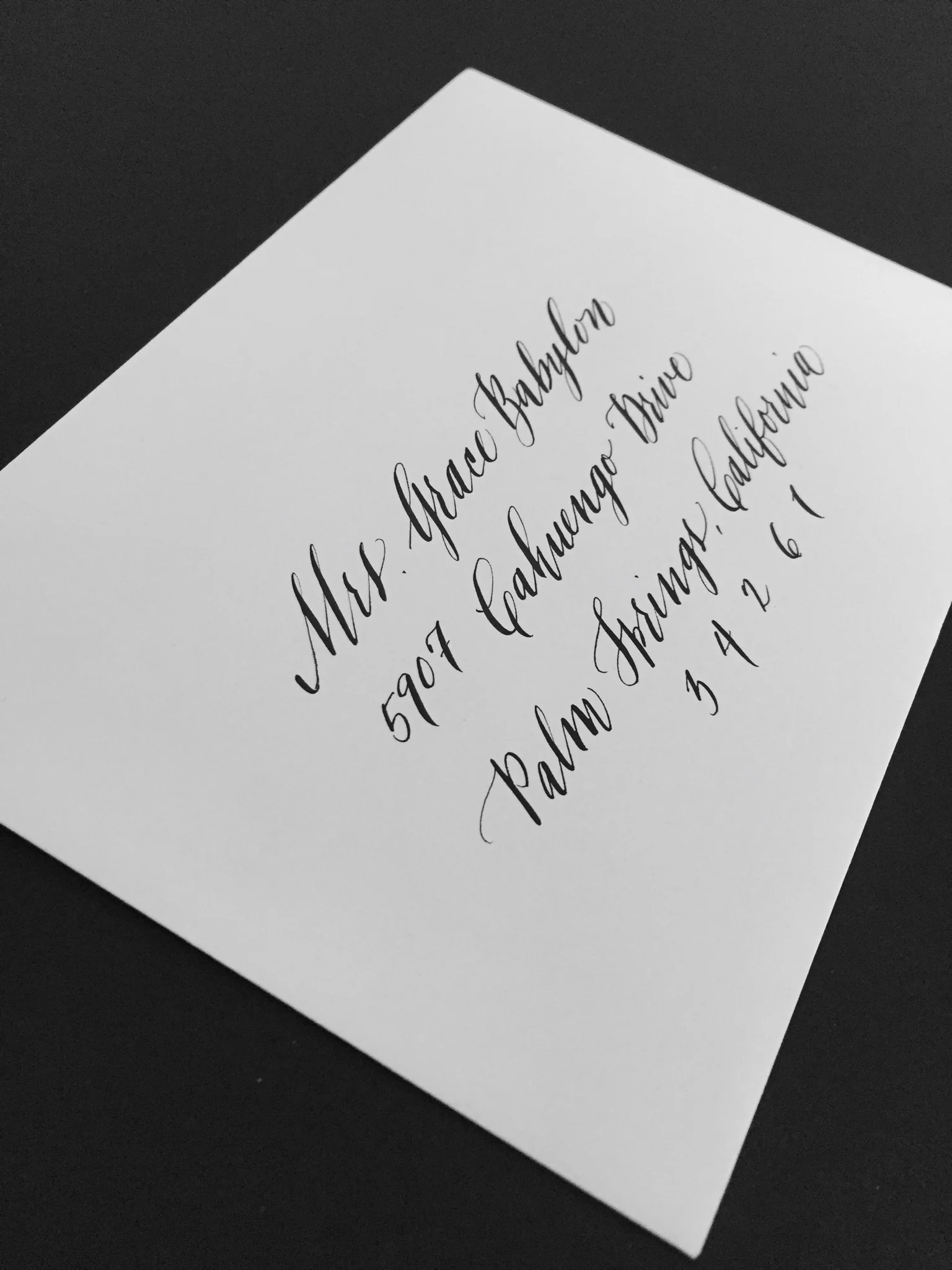 tigerfloss-black-ink-calligraphy-white-envelope.jpg