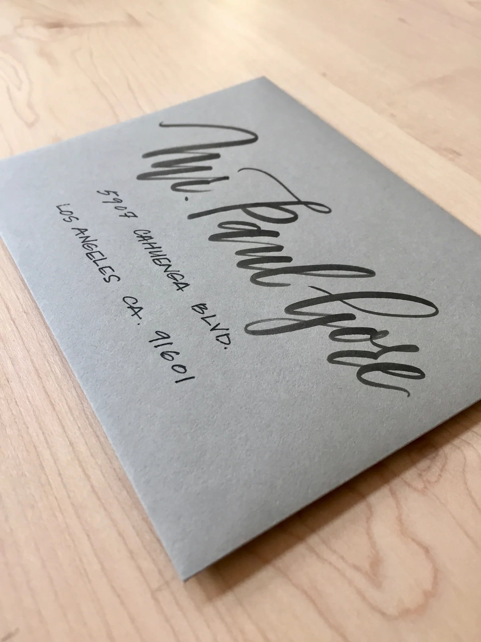 tigerfloss-brush-pen-calligraphy-gray-envelope-side-view.jpg