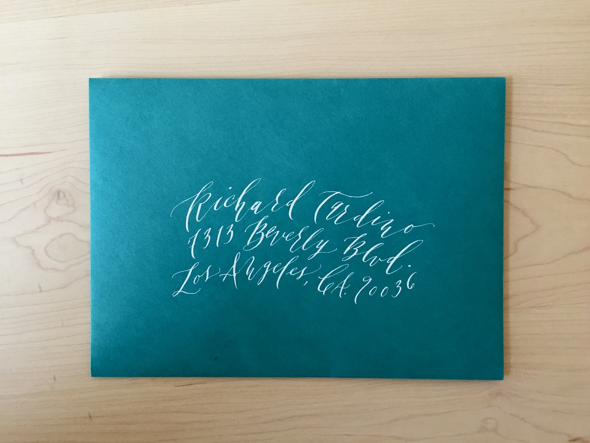 tigerfloss-white-ink-blue-envelope-calligraphy.jpg