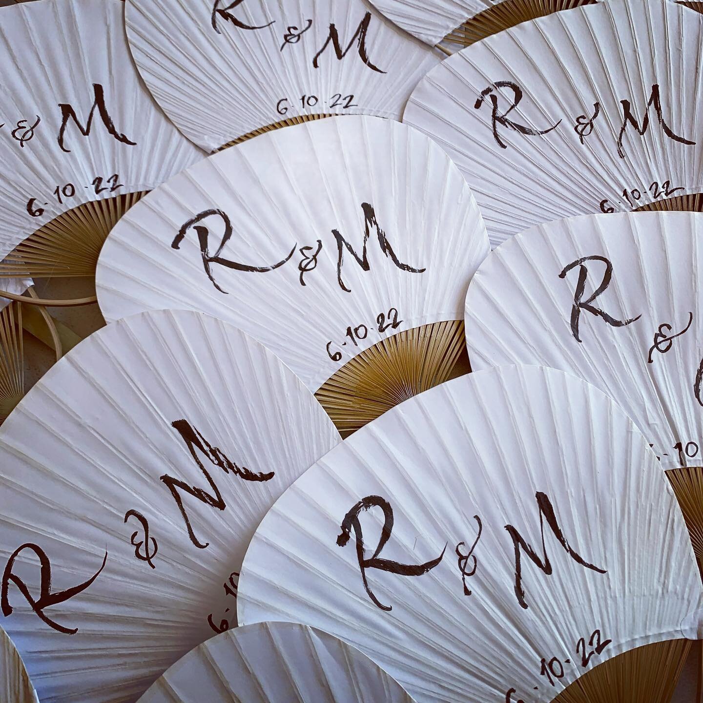 fandamonium. a handsome couple of capitals for a lovely couple's summer destination wedding party. ⁣
⁣
⁣
⁣
⁣
⁣
#handlettering #paperfans #handfans #capitalletters #moderncalligraphy #destinationwedding #destinationweddingfavors #partyfavors #weddingf