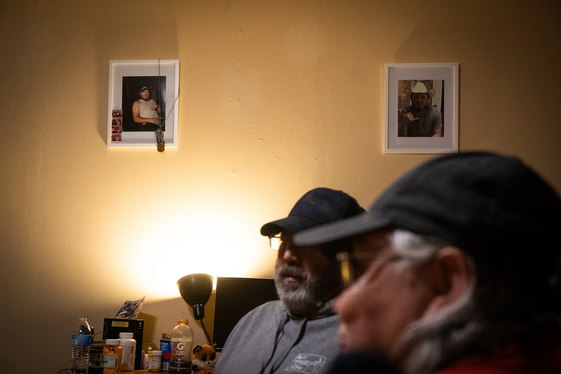 Photos of Casey Schardein, who died in a car accident on August 18, 2018, hang in the living room of his parents, Ed and Iwonne Schardein of Herington, Kansas, on January 15, 2019.