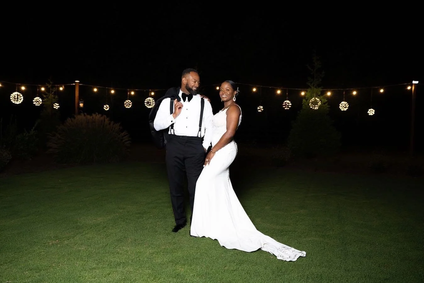 Enchanting Elements:  Experience the Romance of Our Wedding Venue's Breathtaking Lawn and Romantic Lighting