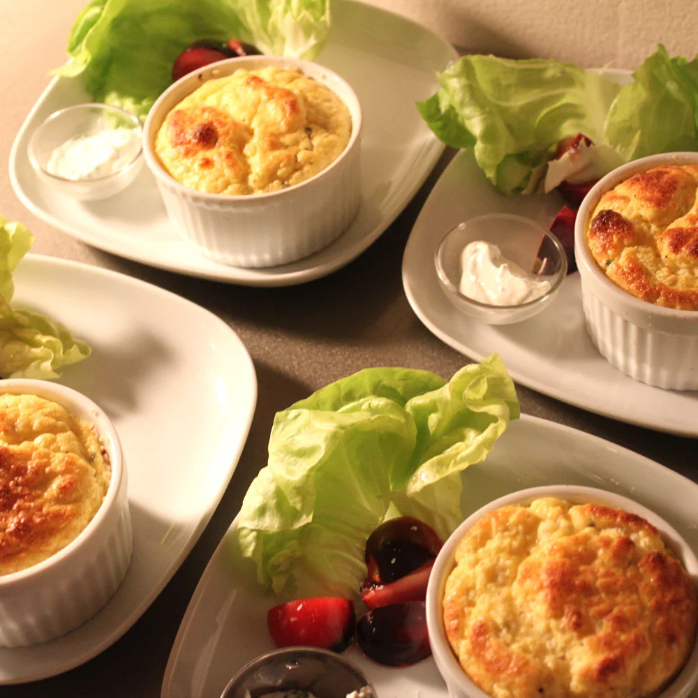 mini-cheese soufflés to kick off a catered dinner in your home
