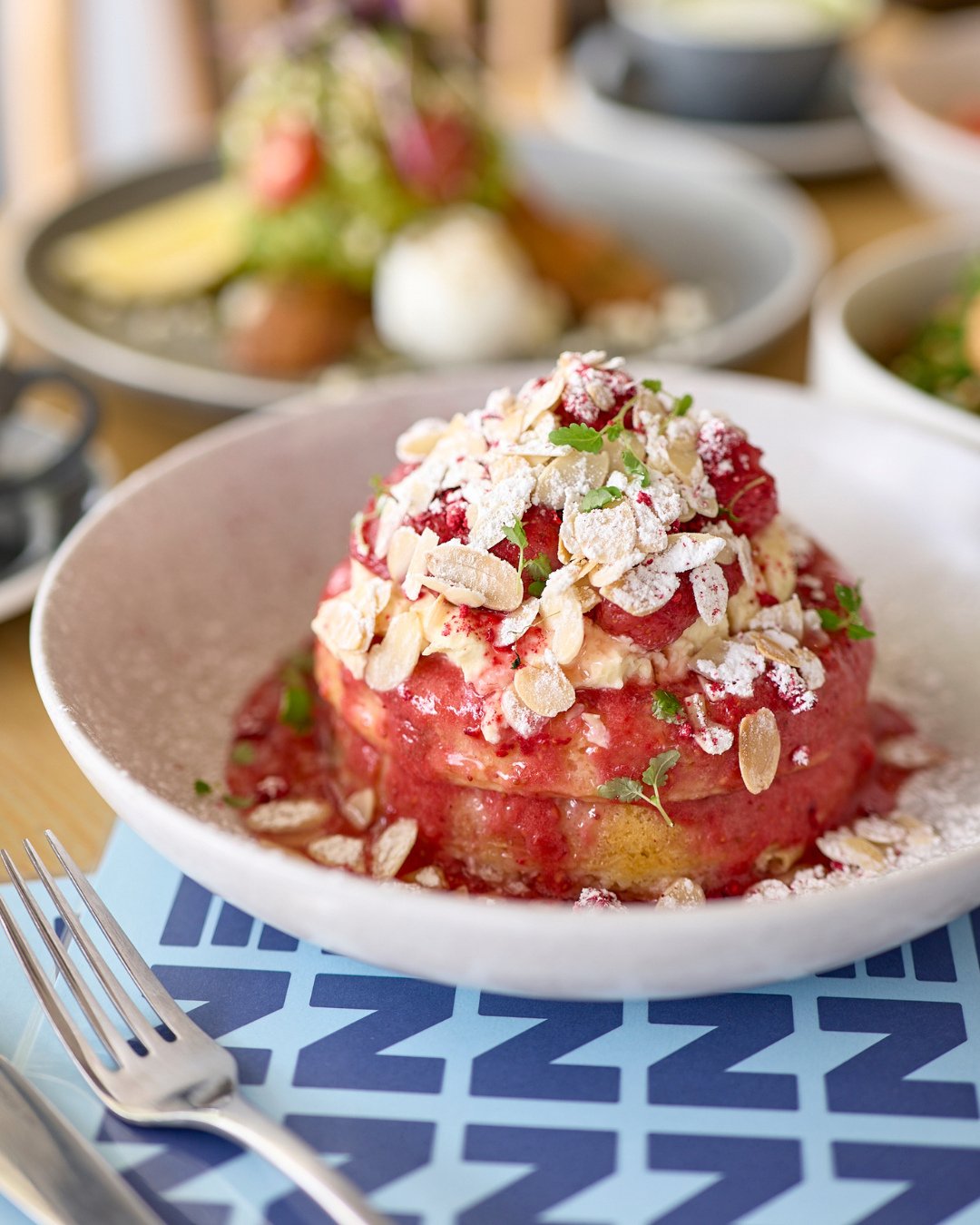 When cravings come to play, it&rsquo;s Strawberries &amp; Cream Hotcakes time to shine! 🥞 Dive into fluffy pancakes topped with macerated strawberries, whipped vanilla mascarpone, strawberry-infused maple syrup and crunchy flaked almonds. One bite, 