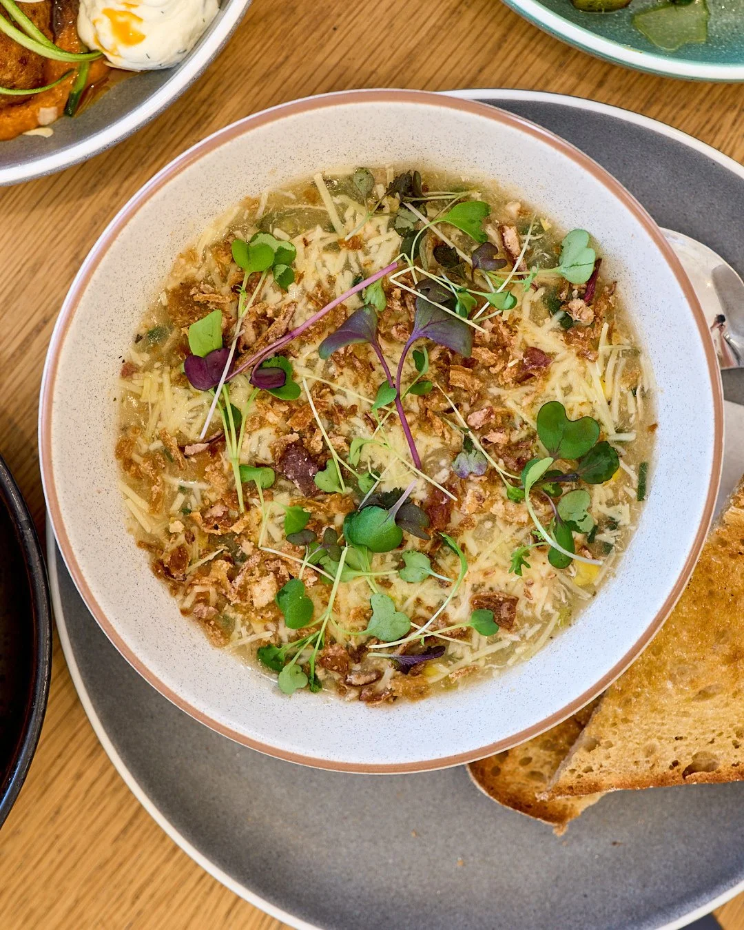 Winter may have left the building, but our Soup of the Day isn&rsquo;t going anywhere (yet). 🍲 Still craving something hot, hearty and delish? Come tuck in. 🥣