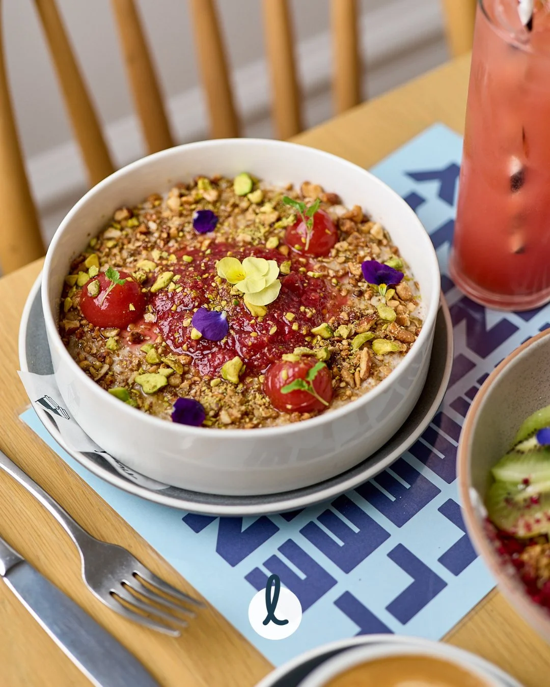 Sure, flowers in your hair are cute, but flowers in your porridge? Weirdly&hellip; perfection 💐⁠
⁠
One bite of our rolled oat, chia &amp; fig porridge with strawberry gel, almond granola, pistachio, and rhubarb compote, and you&rsquo;ll wonder why y