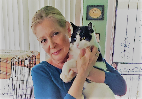Pic of Sharon Clark, Founder of Cat Posse with cat Sascha