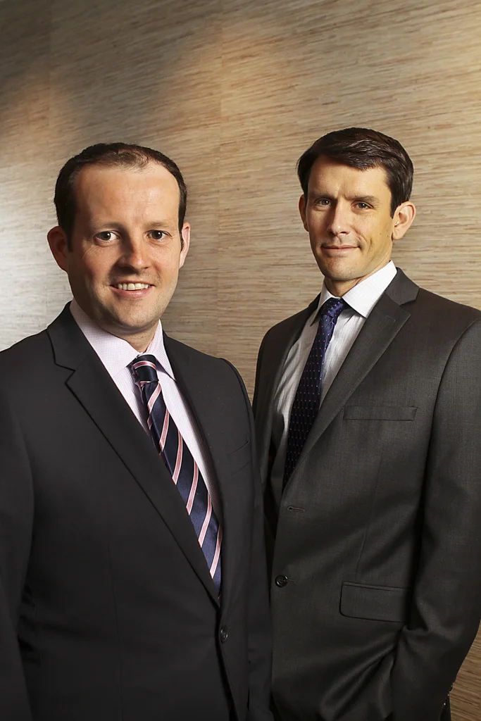 Paul T. Llewellyn and Marc R. Lewis of Lewis & Llewellyn