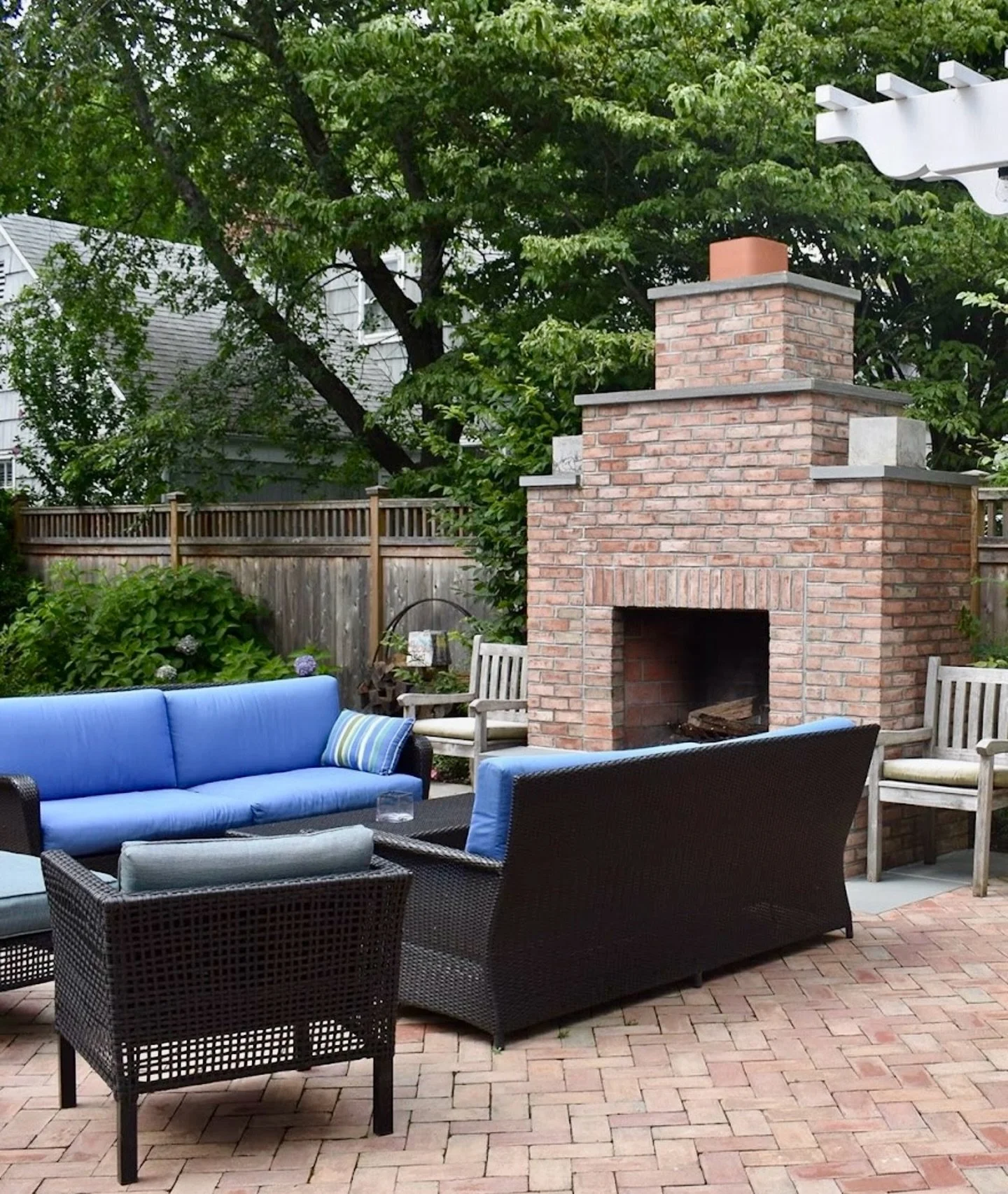 Gather around the fire and imagine evenings made for relaxing. 

This stunning outdoor fireplace by Old South Brick &amp; Supply Co. brings timeless beauty, warmth, and Southern charm to any backyard space. From patios to statement fireplaces, their 