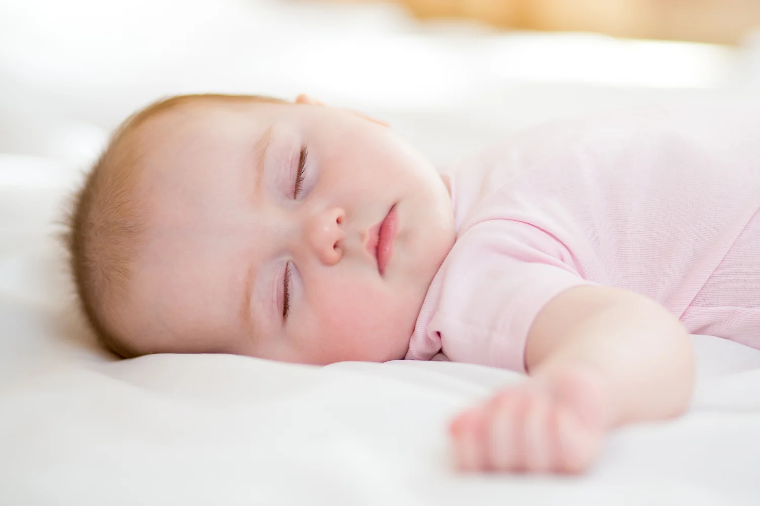 Why Do Infants Sleep With Their Arms Up