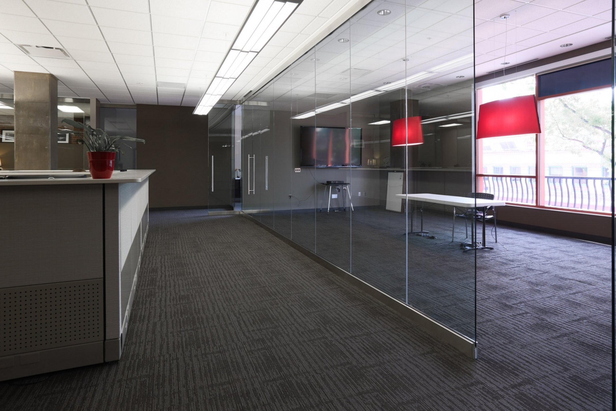 A glass conference room in Stueve Siegel Hanson's newly-remodeled Country Club Plaza office