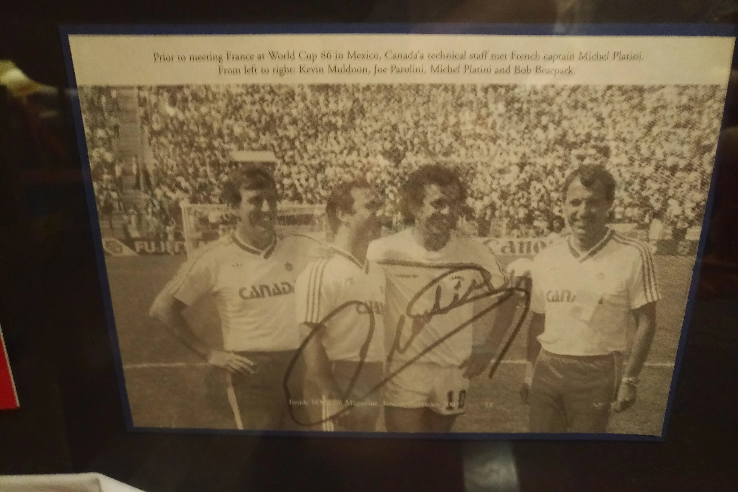Photo with France + Juventus Captain, Michel Platini, prior to kick off between Canada & France in Azteca Stadium at the 1986 World Cup in Mexico. L-R (Kevin Muldoon, Joe Parolini, Michel Platini, & Bob Bearpark).