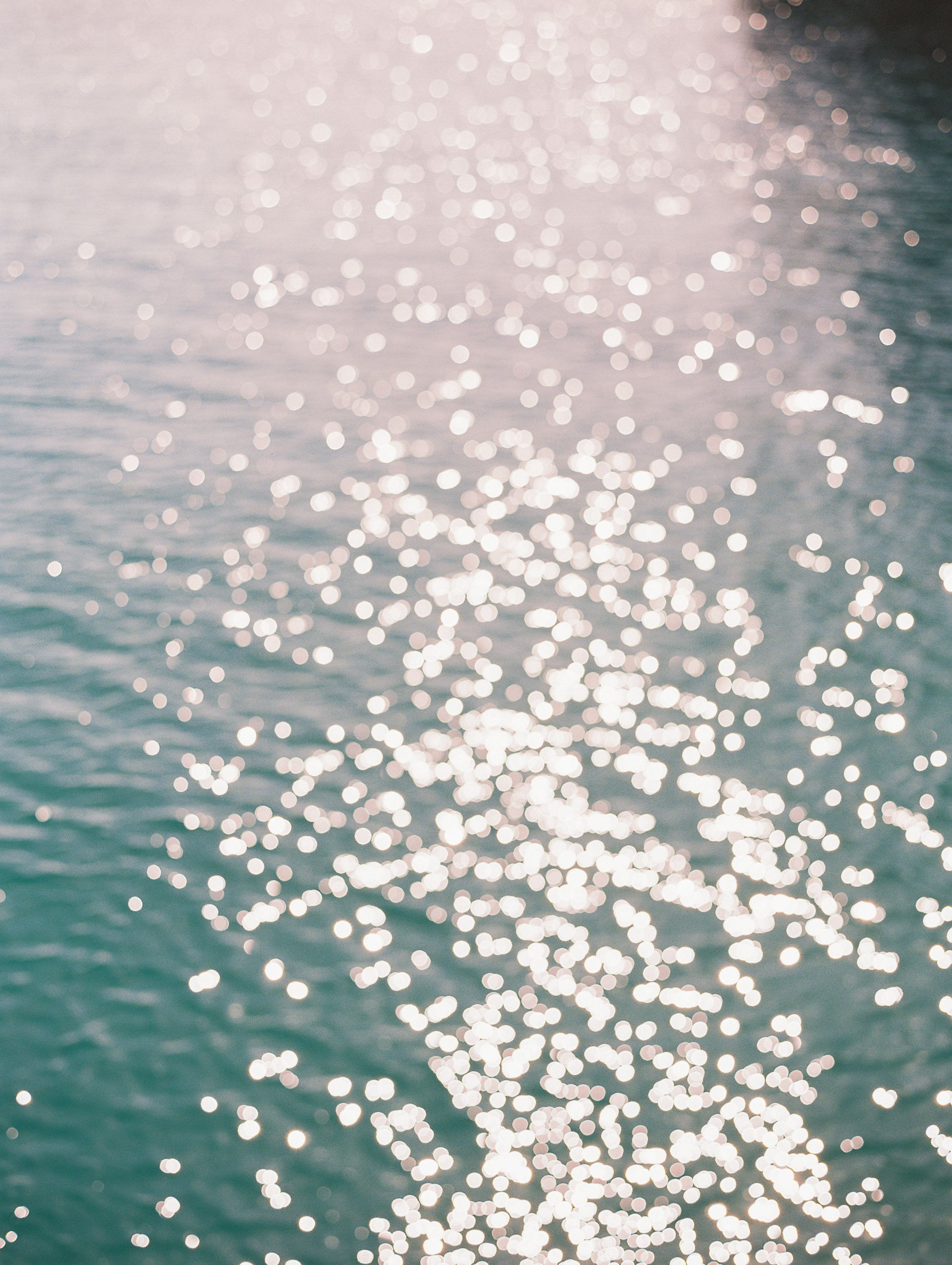 lauramurray-travel-destinationphotography-creativetravel-artists-filmphotography-unearthingtc-water-reflection-light.jpg