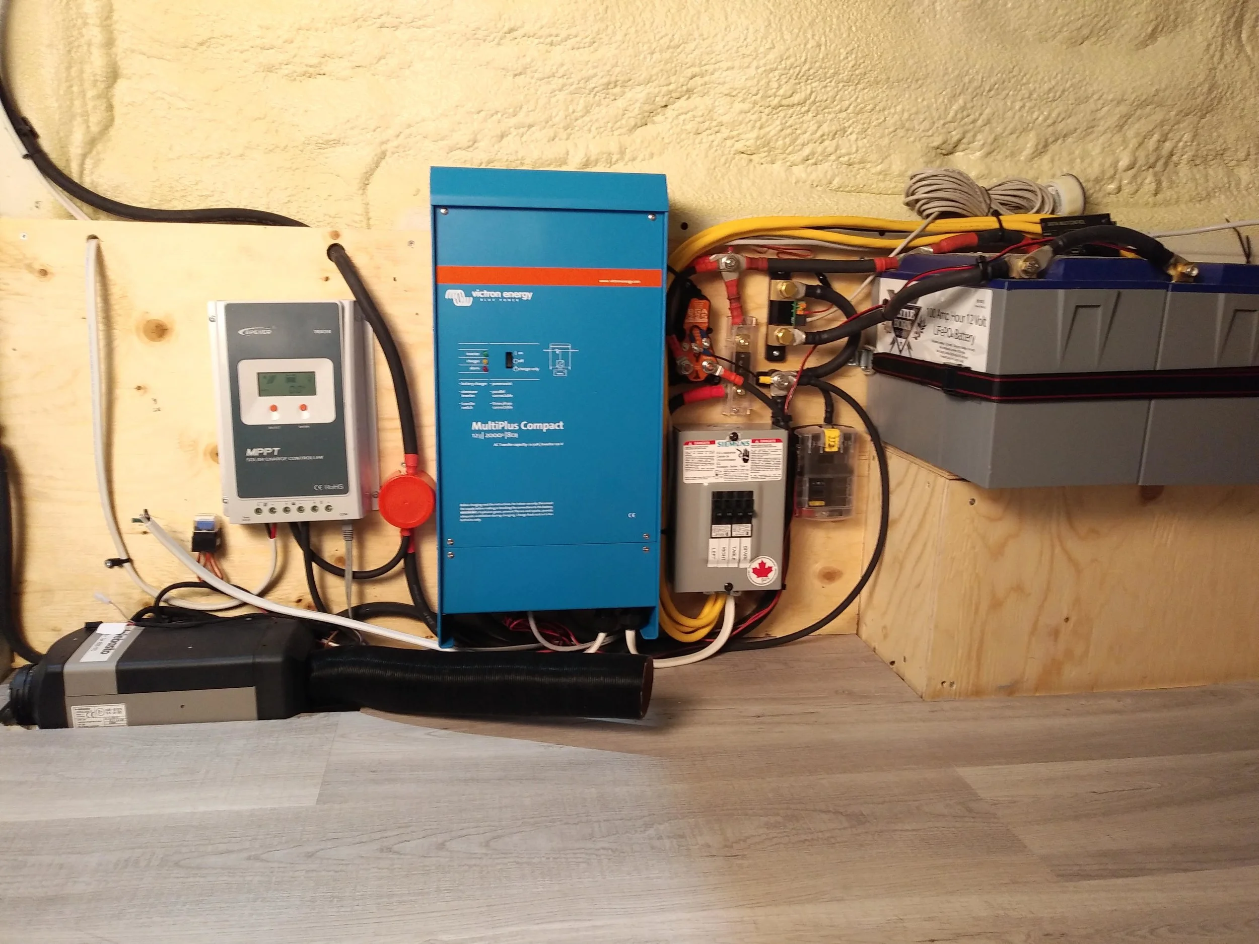 Webasto Install. Full electrical system - solar, shore and alternator charging with 400w of solar and 200ah of Battle Born lithium batteries.