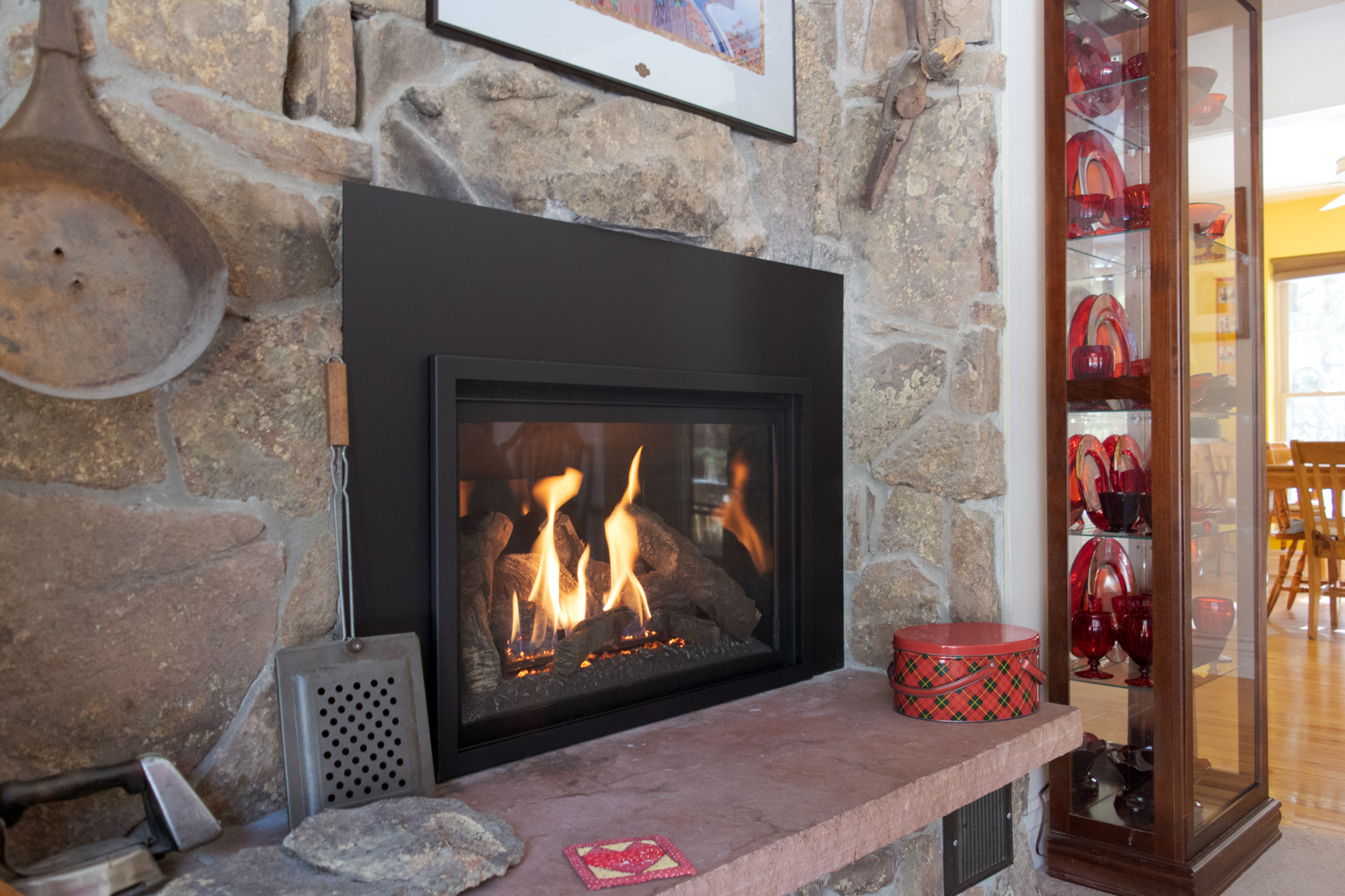 Kozy Heat Chaska gas insert in a unique Evergreen ranch home.