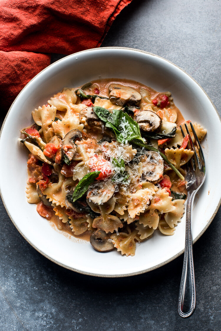 Farfalle Pasta with Spinach and Mushrooms in a Creamy Tomato Sauce —  Flourishing Foodie