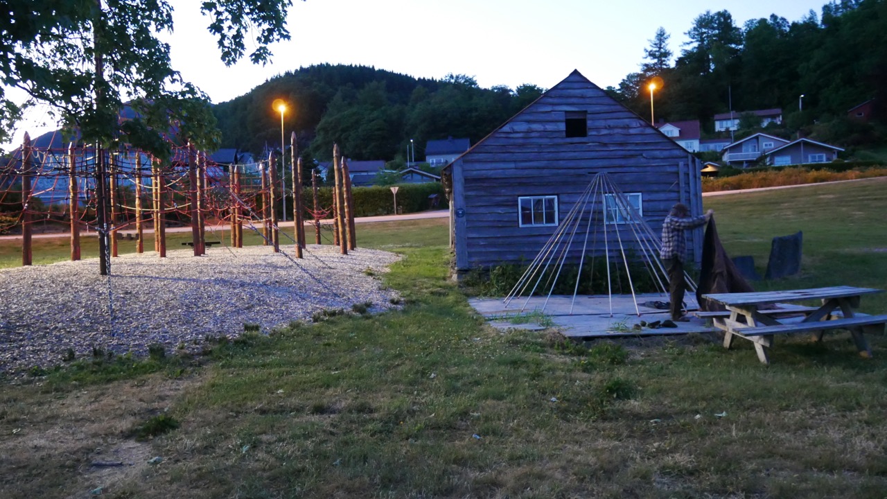 Lavvu set up next to the jungle gym. 