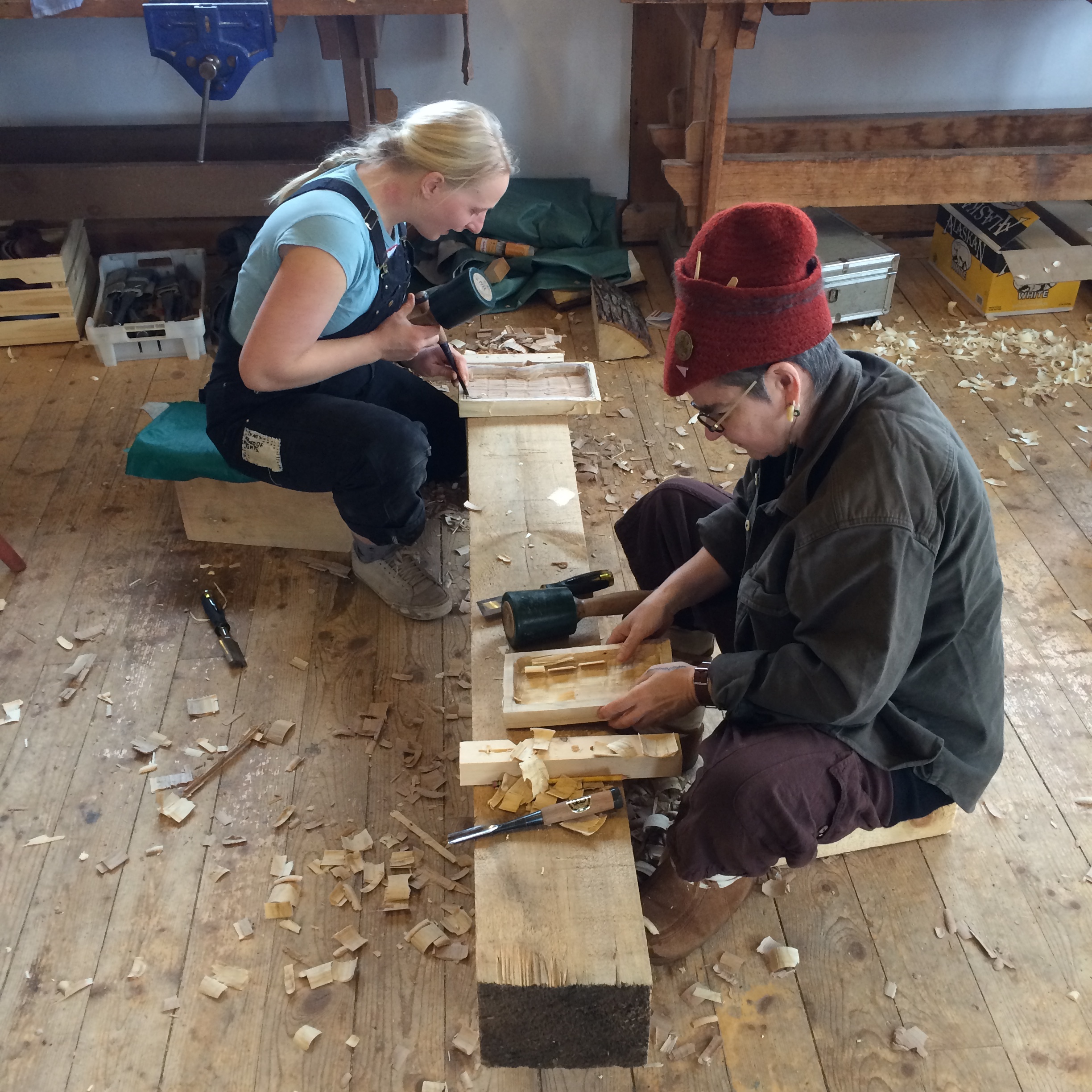 Lifelong learners (& teachers) Rose Holdorf & Liesl Chatman carving away.