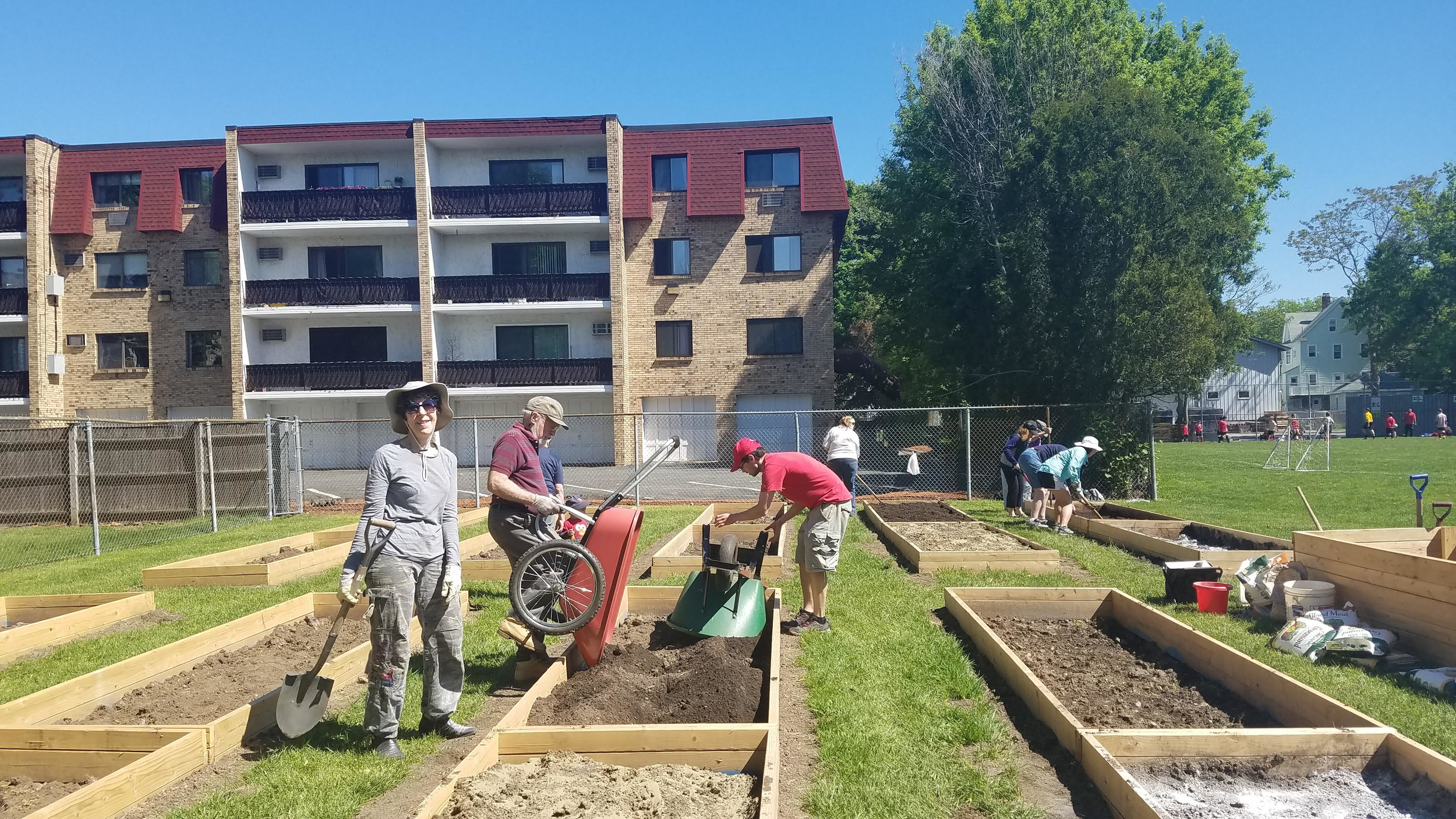 Community Garden - Adding soil to the plots.jpg