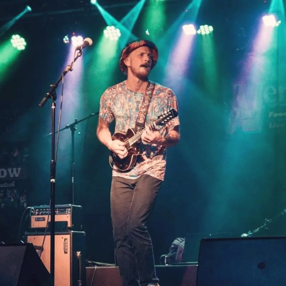  Originally from Louisiana, Luke is a Mandolin player!! Well-versed in Bluegrass, Funk, Jam Band, he brings soul and joy to the group with his vocal harmonies, improvisational attitude and musical sensibility. 