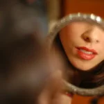 red_lips_in_mirror1-150x150.jpg