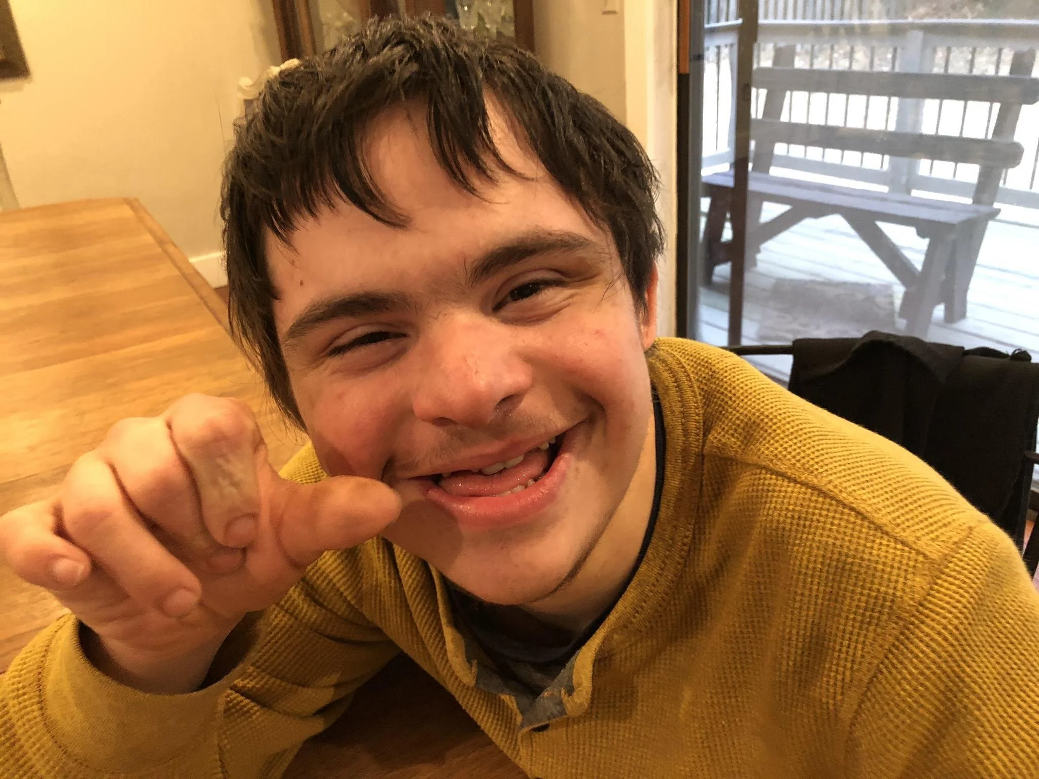 Jonathan smiling before dinner 17 years old.jpg