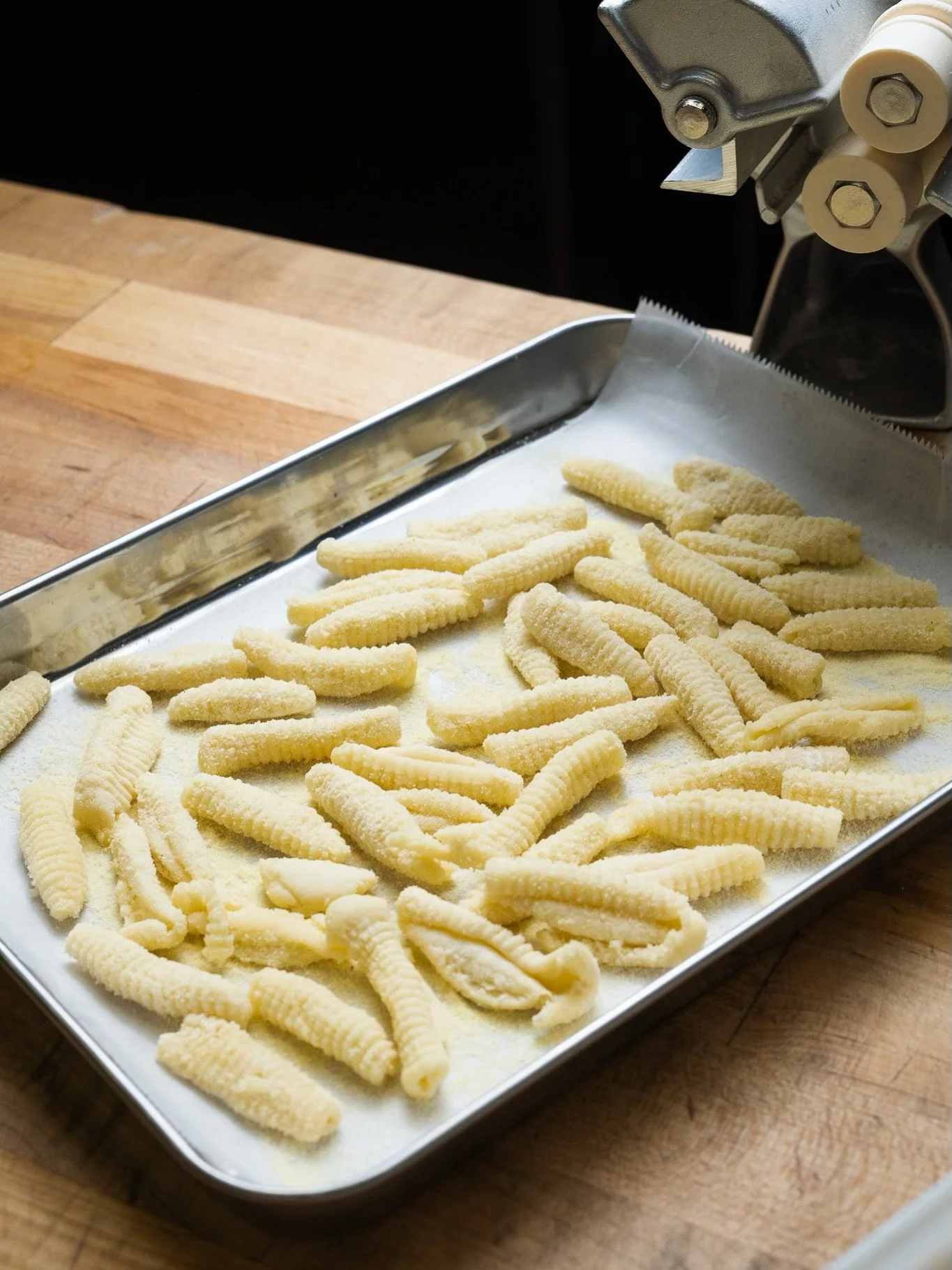 { Fourth Course: Pasta }
Our newest dish, Handmade Ricotta Cavatelli, is Chef Allen Routt&rsquo;s interpretation of a pasta inspired by pizza. House-cured pork belly, seasoned in the tradition of pepperoni spice, is paired with romanesco and tender r