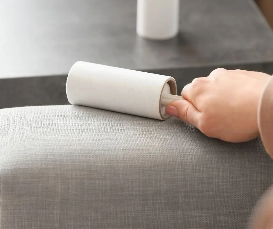 Lint roller on couch