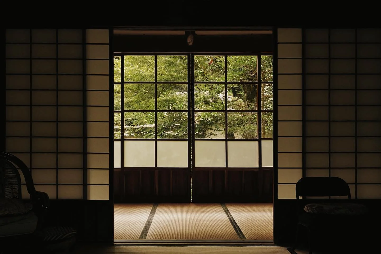 Traditional Japanese architecture blurs the boundary between inside and outside. 
Wide openings welcome nature in, creating interiors where light, silence, and landscape exist in perfect harmony.