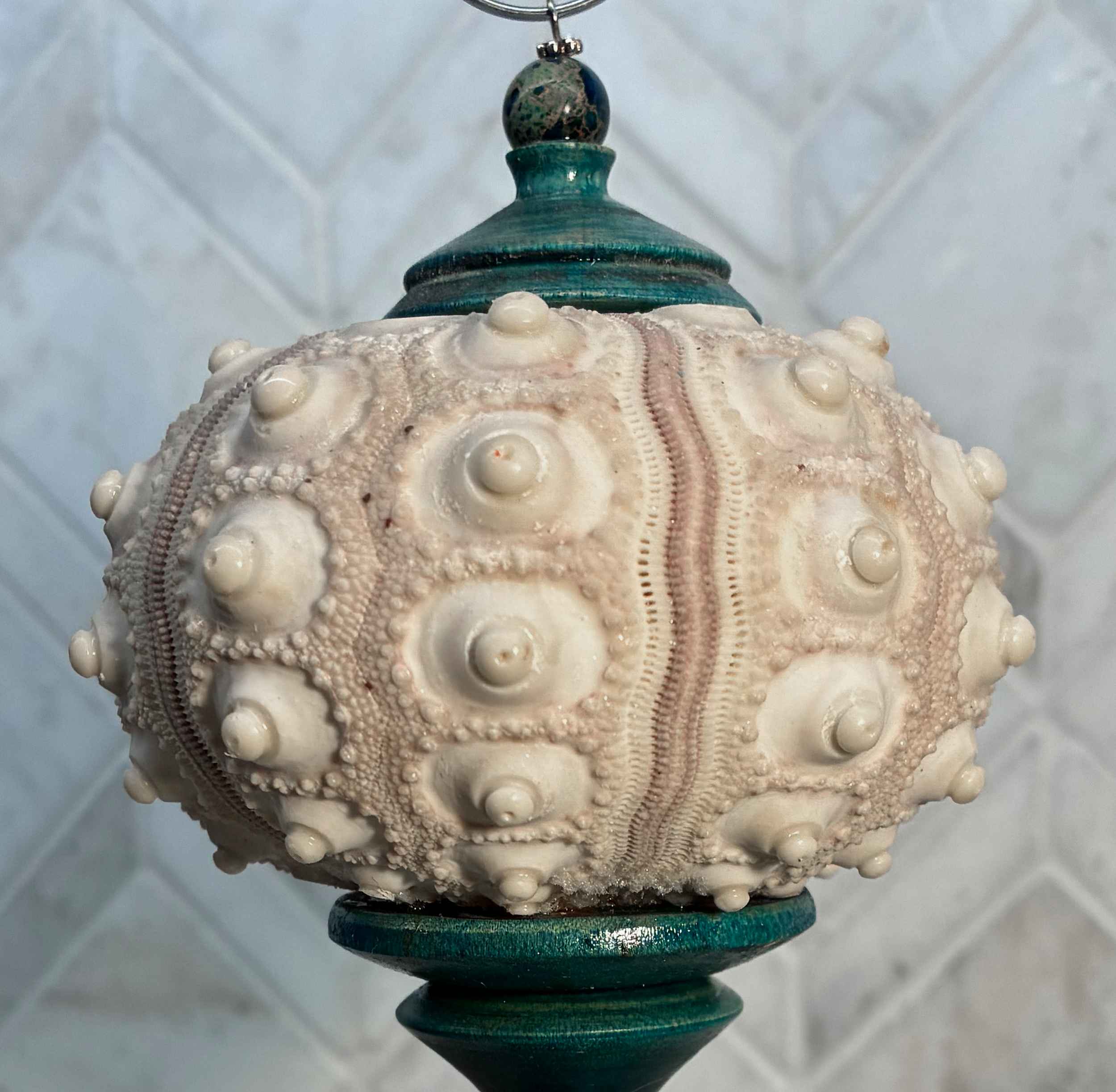 Sputnik teal ball.png