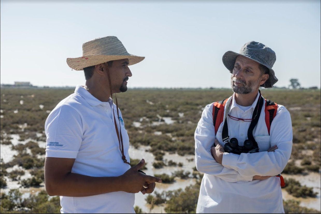 MEET Diaries Tunisia 2019 - One of our MEET Ambassador´s Pascal Abdullah speaking to a bird expert in Tunisia.PNG