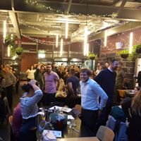 Supporters enjoying a game of Heads or Tails at our IWD Trivia