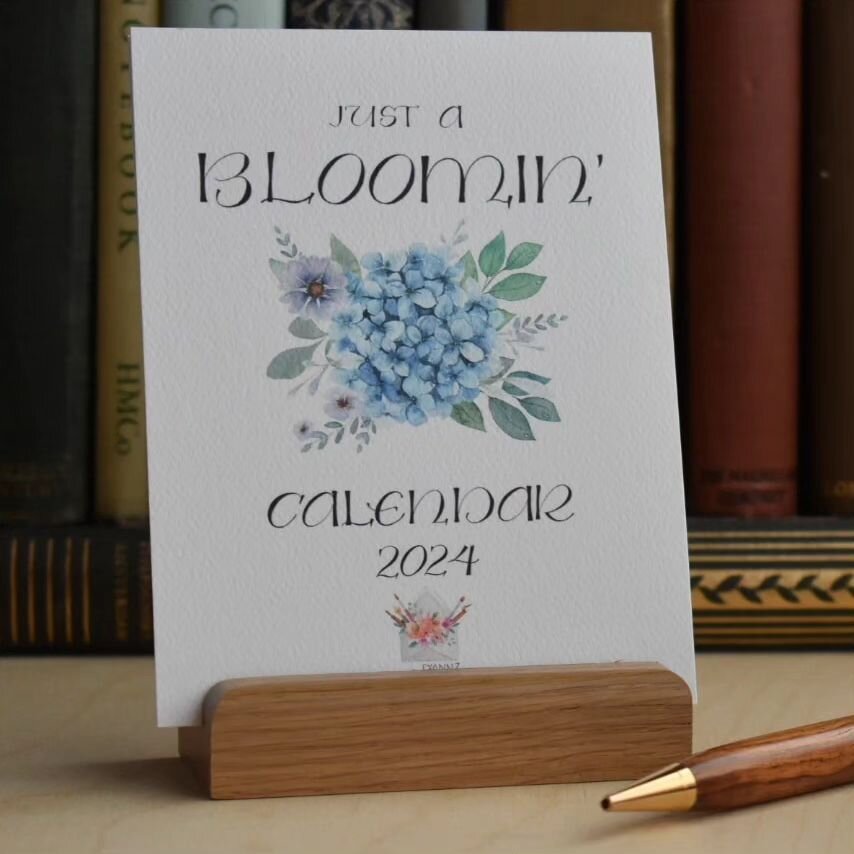 Are you all set for a new desk calendar yet?  Each month of my &quot;Just a Bloomin' Calendar&quot; for 2024 features my watercolor florals and handlettering (the hydrangea is my favorite!) Head to my website to order yours; www.diannzletters.com 

N