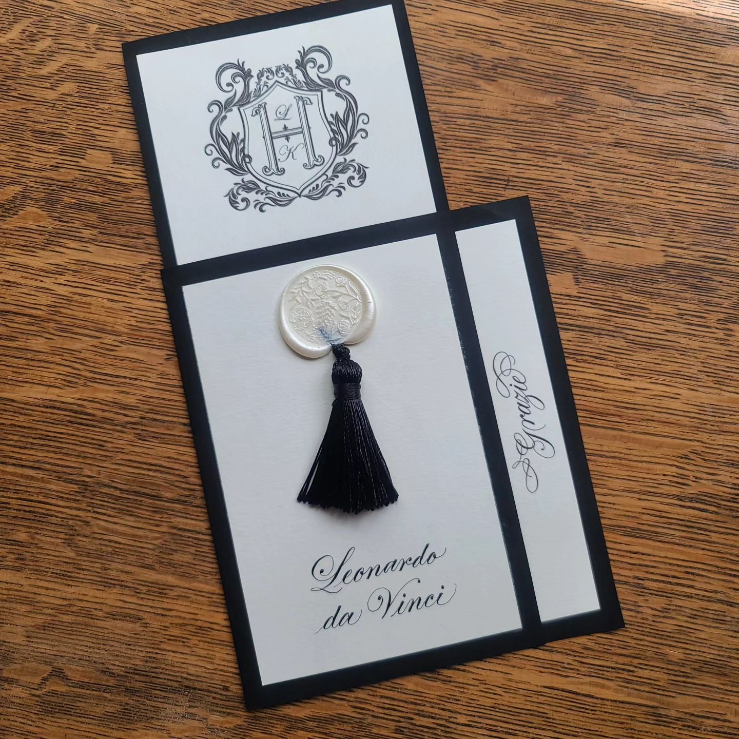 A place card, menu, and thank you for coming to our destination wedding all together! I enjoyed working with the bride and her mum to design these keepsakes for each guest (well, Leonardo wasn't actually on the guest list). These will be placed on ea