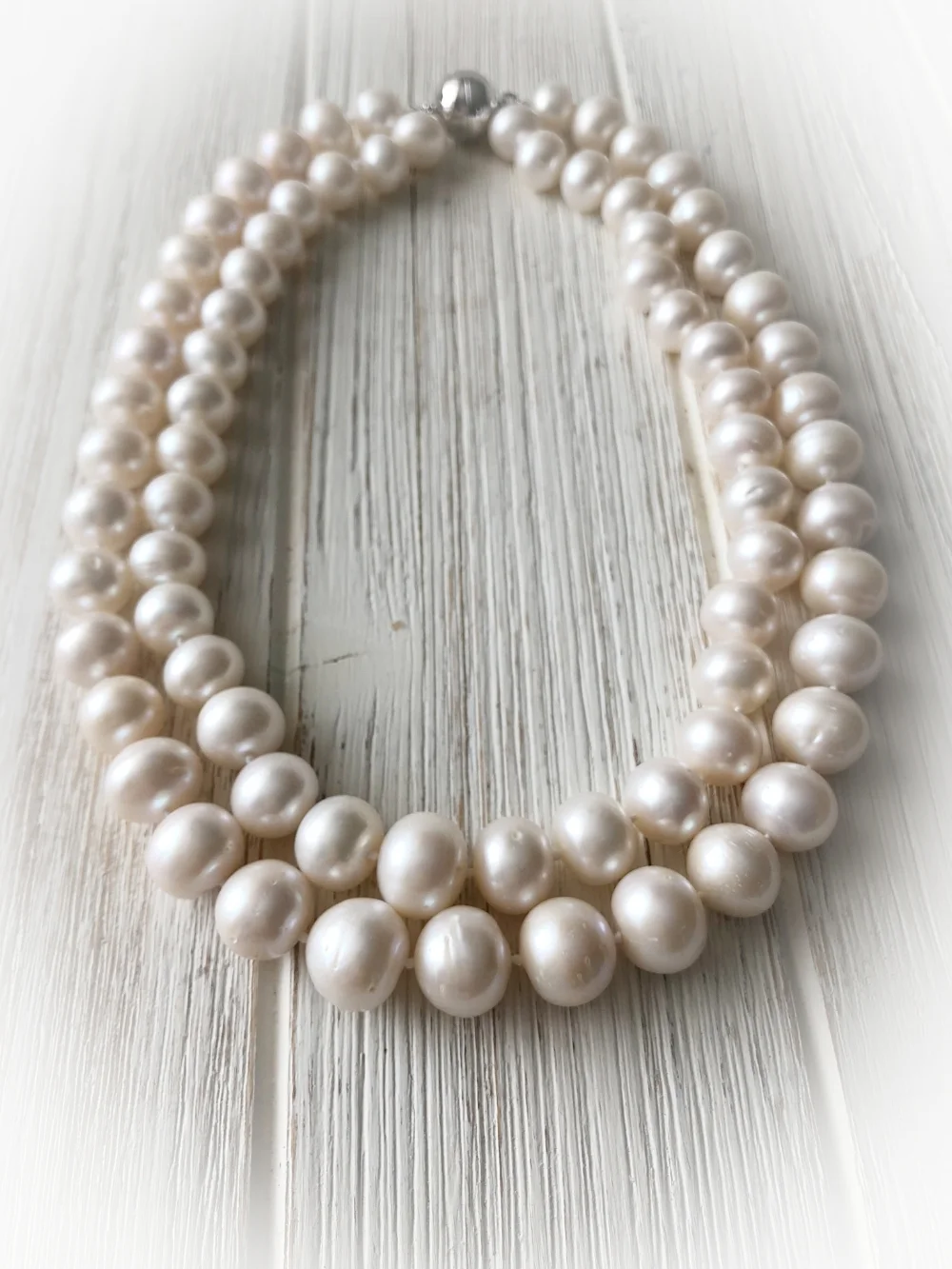 Freshwater Pearl Necklace 10-11 mm pearls , 16 and 18" length with silver magnet clasp To Purchase email 88Jewels Ltd. Please Include the name of item.