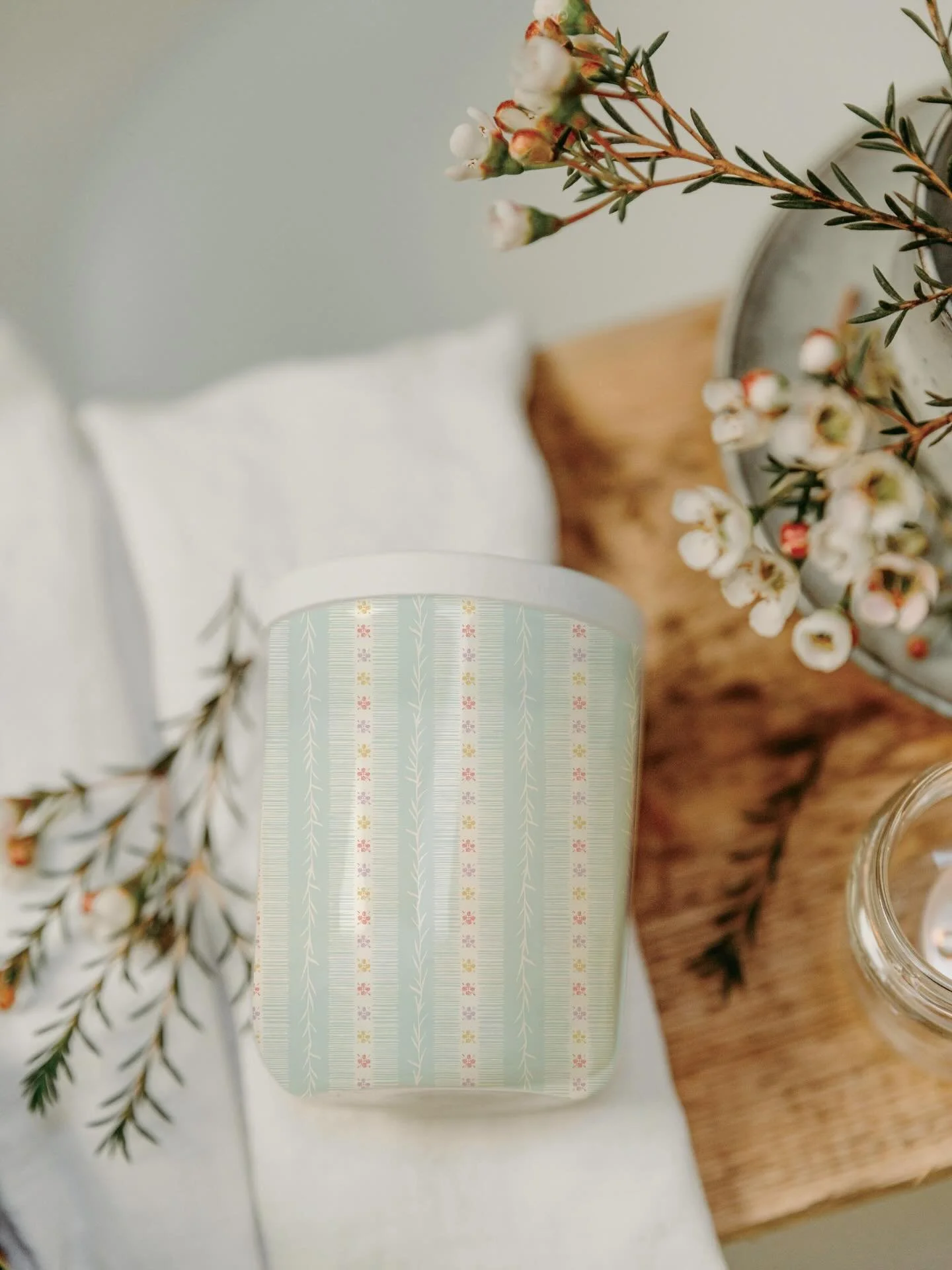 A single candle flickers, and time seems to slow wrapping the room in the gentle calm of nights when life moved a little slower.