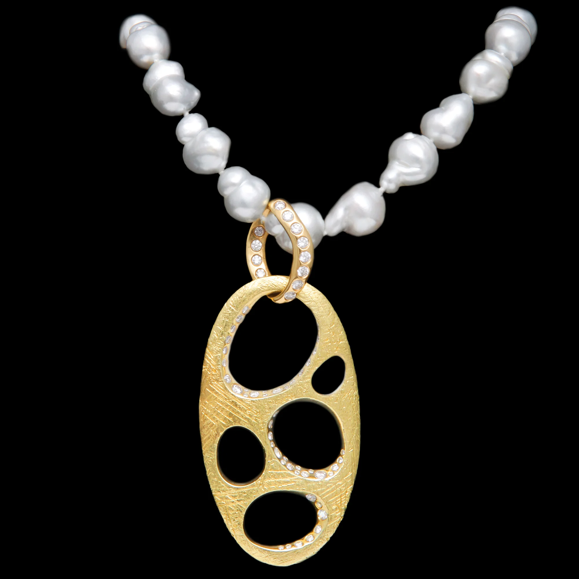 FRIDA | Fine Jewellery. Ocean Collection, Puddle pendant. Custom designed pendant in 18kt yellow gold set with brilliant cut diamonds. View 2.