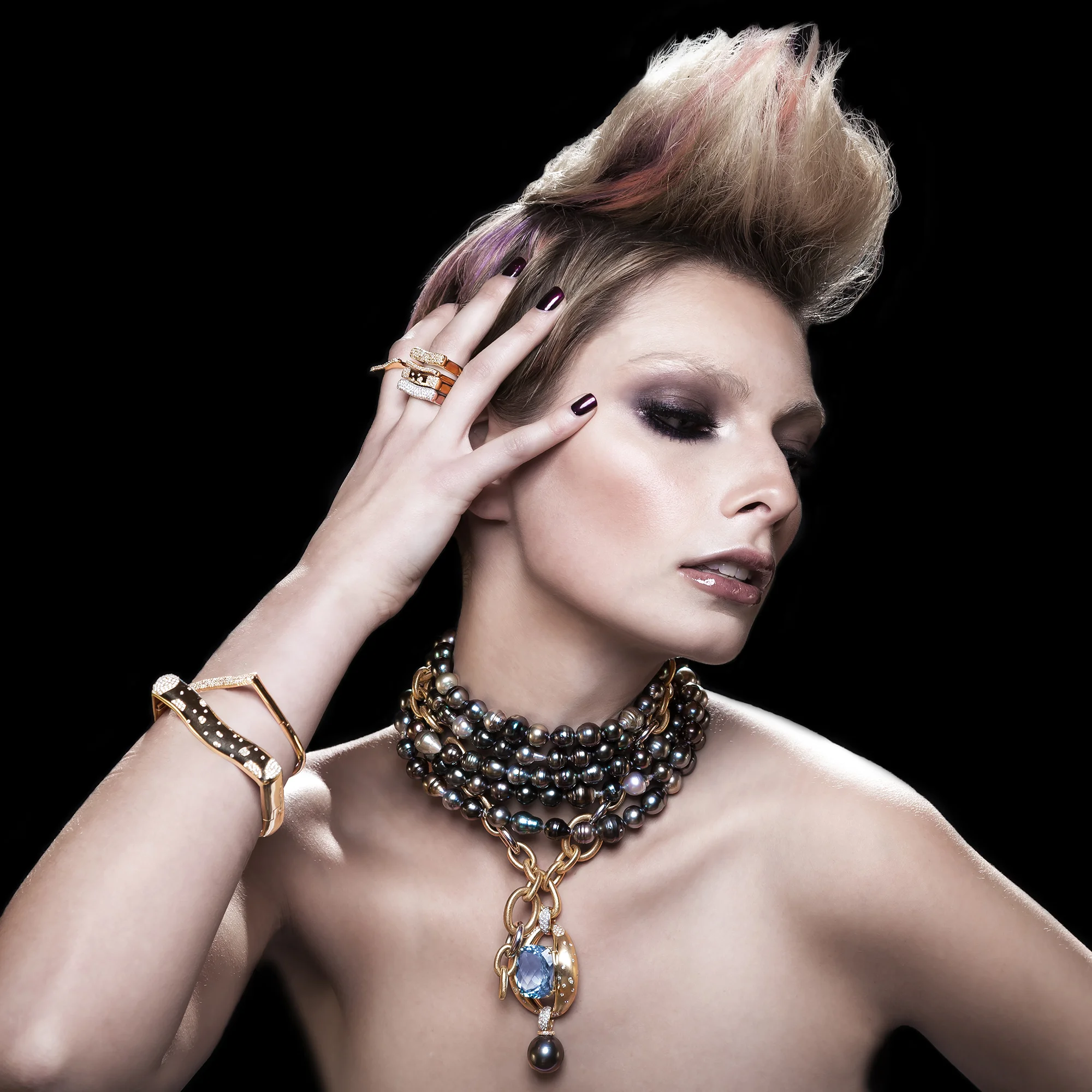 FRIDA | Fine Jewellery. Strata™ Collection. Emma Lamb modeling diamond stacking bracelets and rings in 18kt yellow gold.