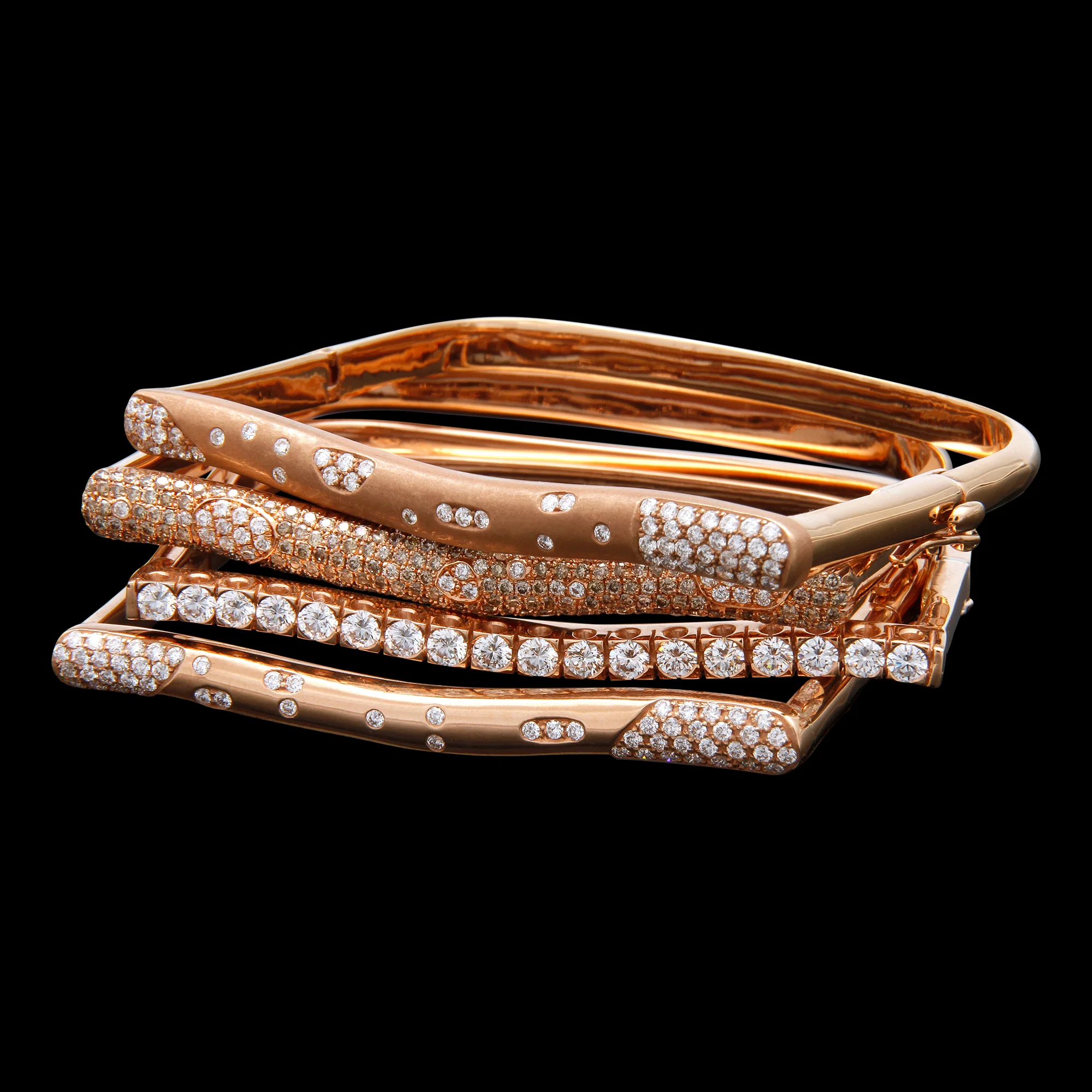 FRIDA | Fine Jewellery. Strata™ Collection. Diamond stacking bracelets in 18kt pink gold.