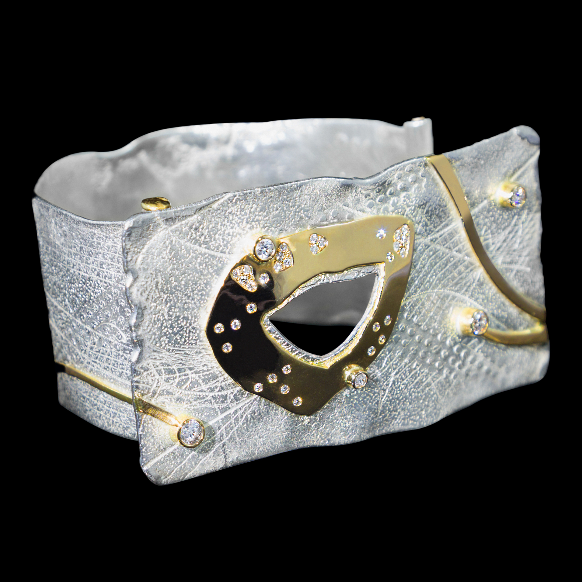 FRIDA | Fine Jewellery. Shield™ Collection, Shackle cuff. Custom designed cuff in sterling silver and 18kt yellow gold set with brilliant-cut diamonds.