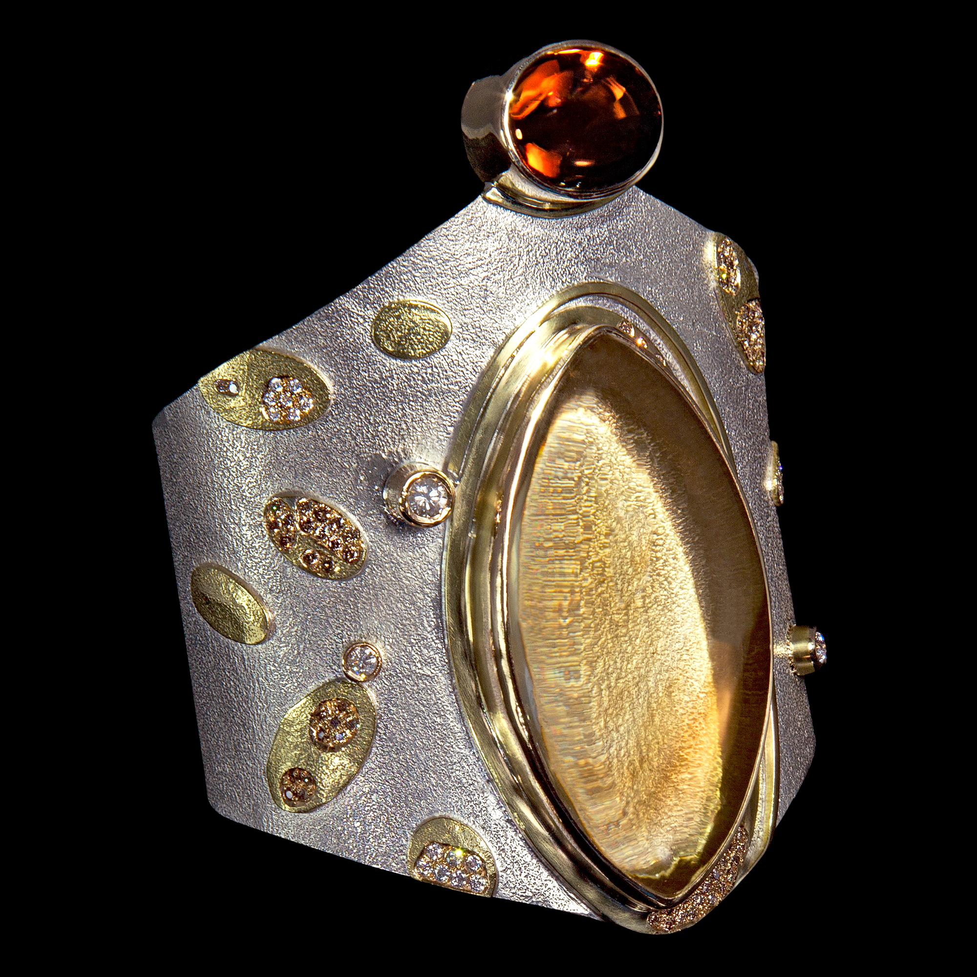 FRIDA | Fine Jewellery. Shield™ Collection, Amira cuff. Custom designed cuff in sterling silver and 18kt yellow gold set a golden quartz, bi-coloured tourmaline and brilliant-cut diamonds.