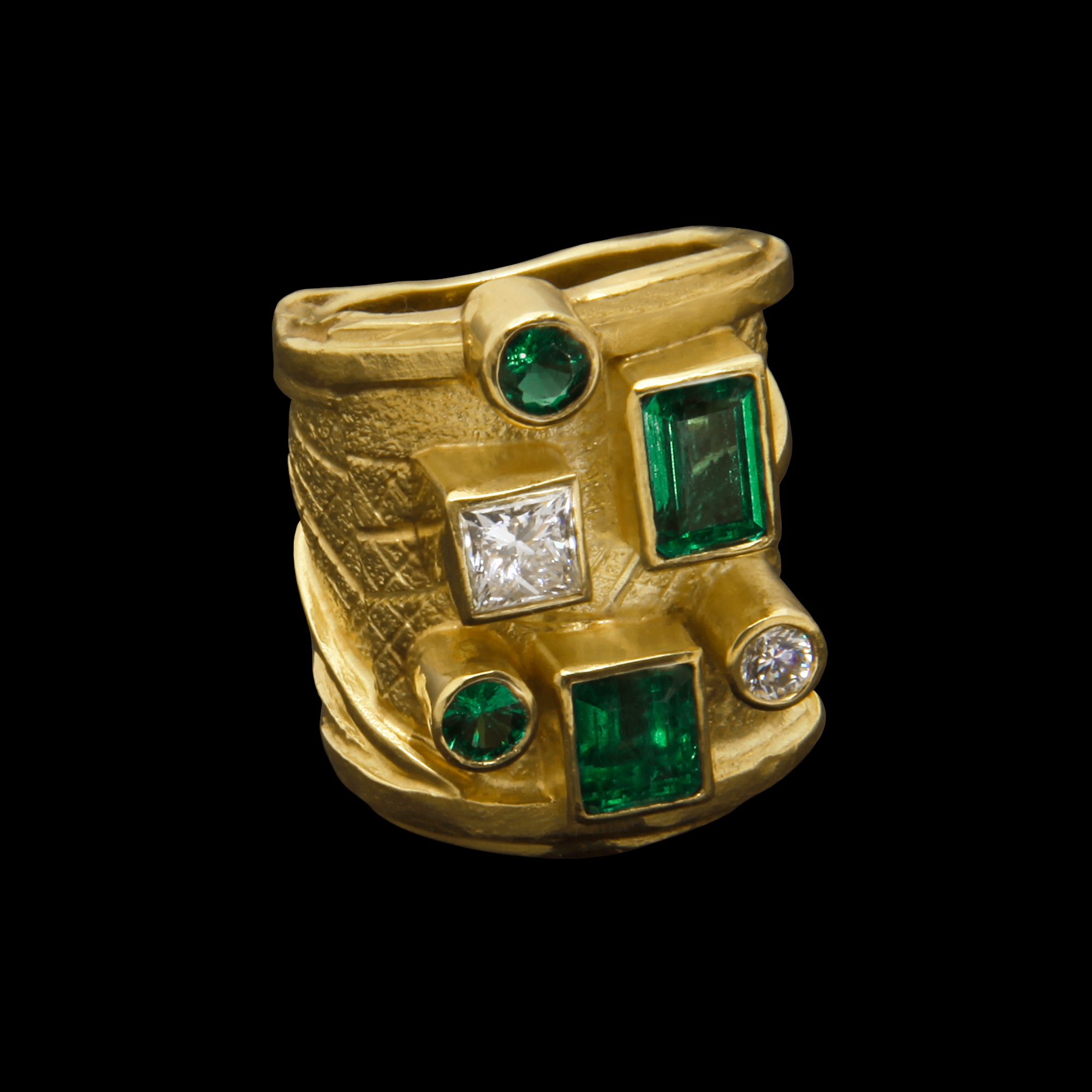 FRIDA | Fine Jewellery. Shield™ Collection, Testudo ring. Custom designed ring in 18kt yellow gold set with faceted emeralds and diamonds.