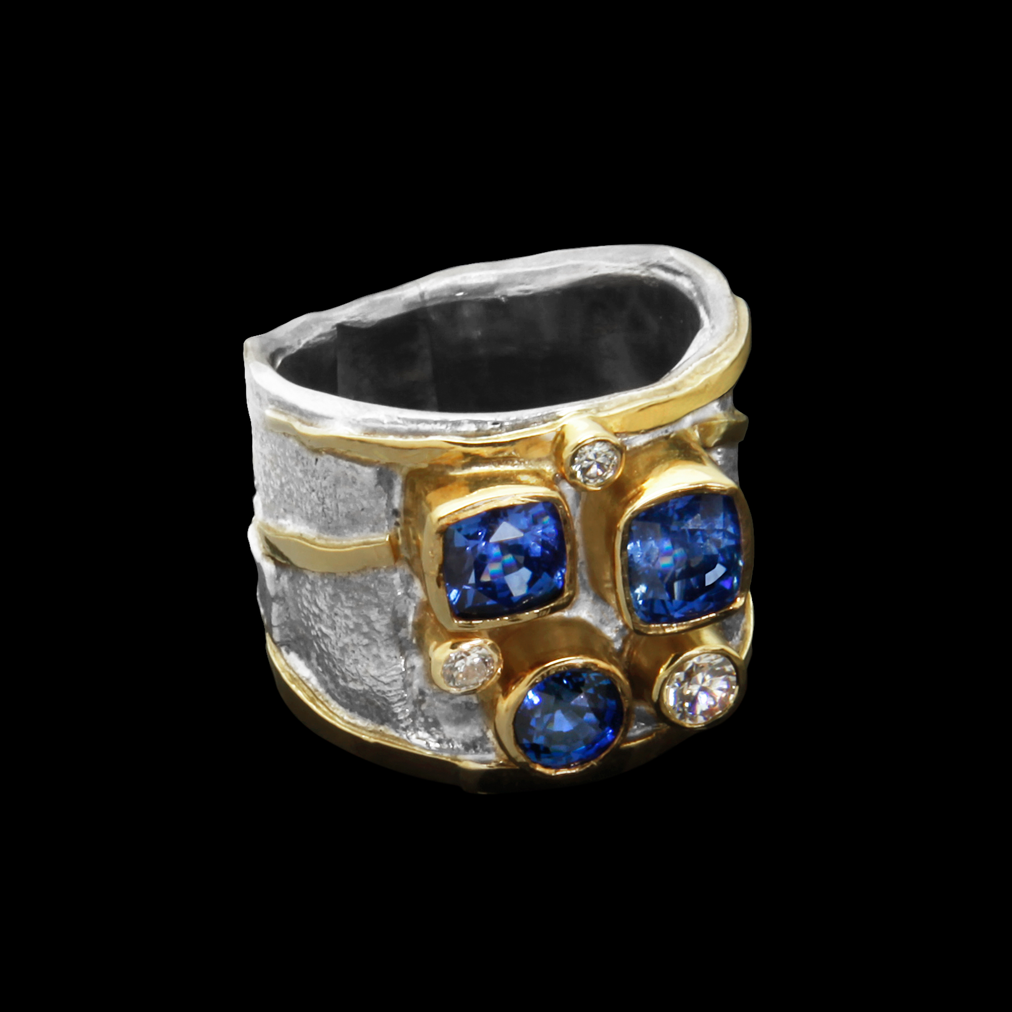 FRIDA | Fine Jewellery. Shield™ Collection, Testudo ring. Custom designed ring in sterling silver and 18kt yellow gold set with faceted blue sapphires and diamonds.