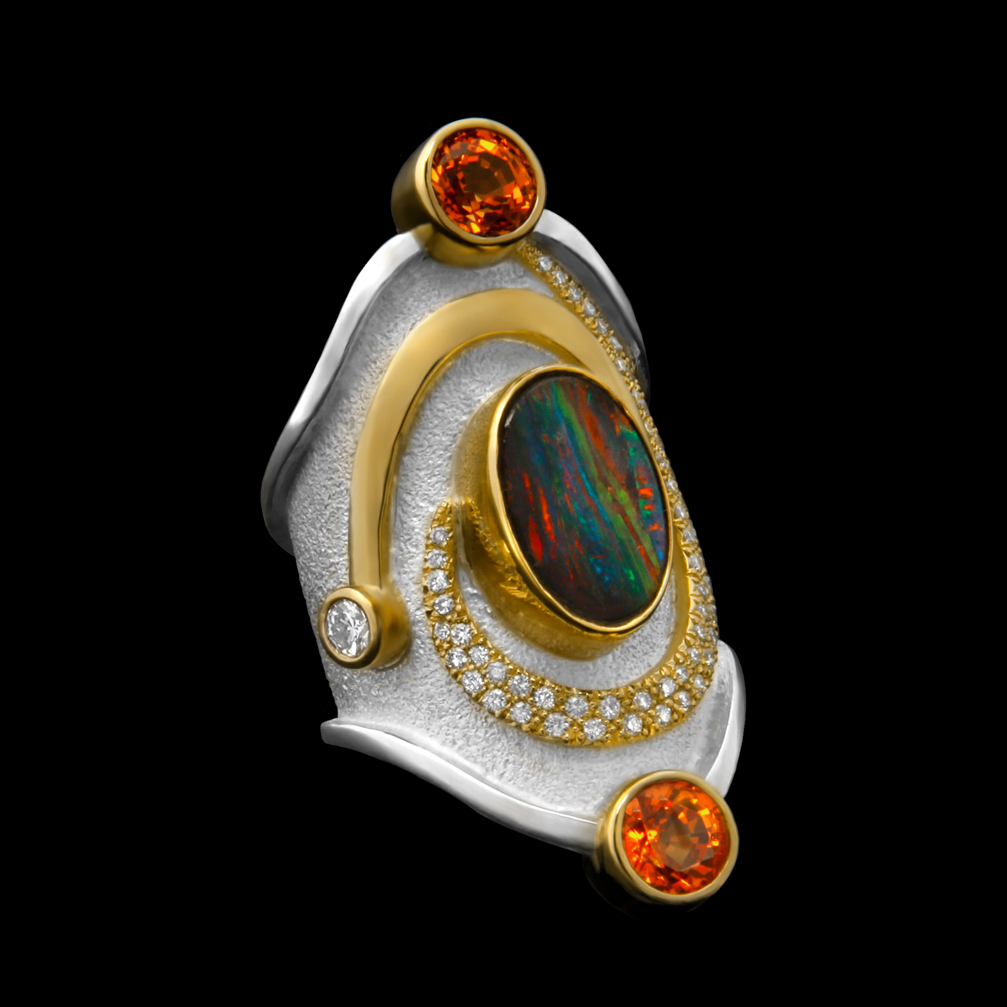FRIDA | Fine Jewellery. Shield™ Collection, Charlemagne ring. One-of-a-kind ring in sterling silver and 18kt yellow gold set with a rare black opal, sapphires and brilliant-cut diamonds. View 1.