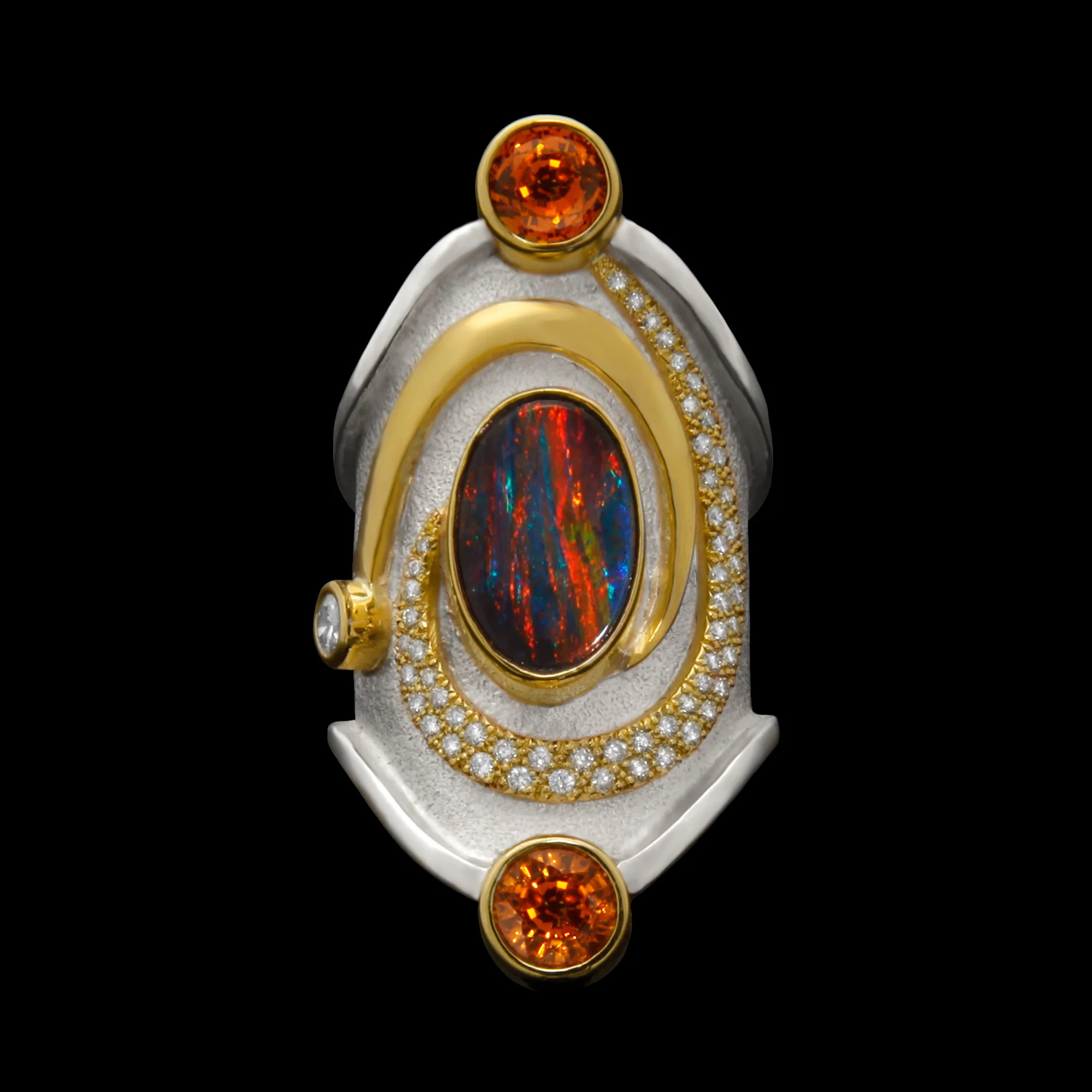 FRIDA | Fine Jewellery. Shield™ Collection, Charlemagne ring. One-of-a-kind ring in sterling silver and 18kt yellow gold set with a rare black opal, sapphires and brilliant-cut diamonds. View 2.