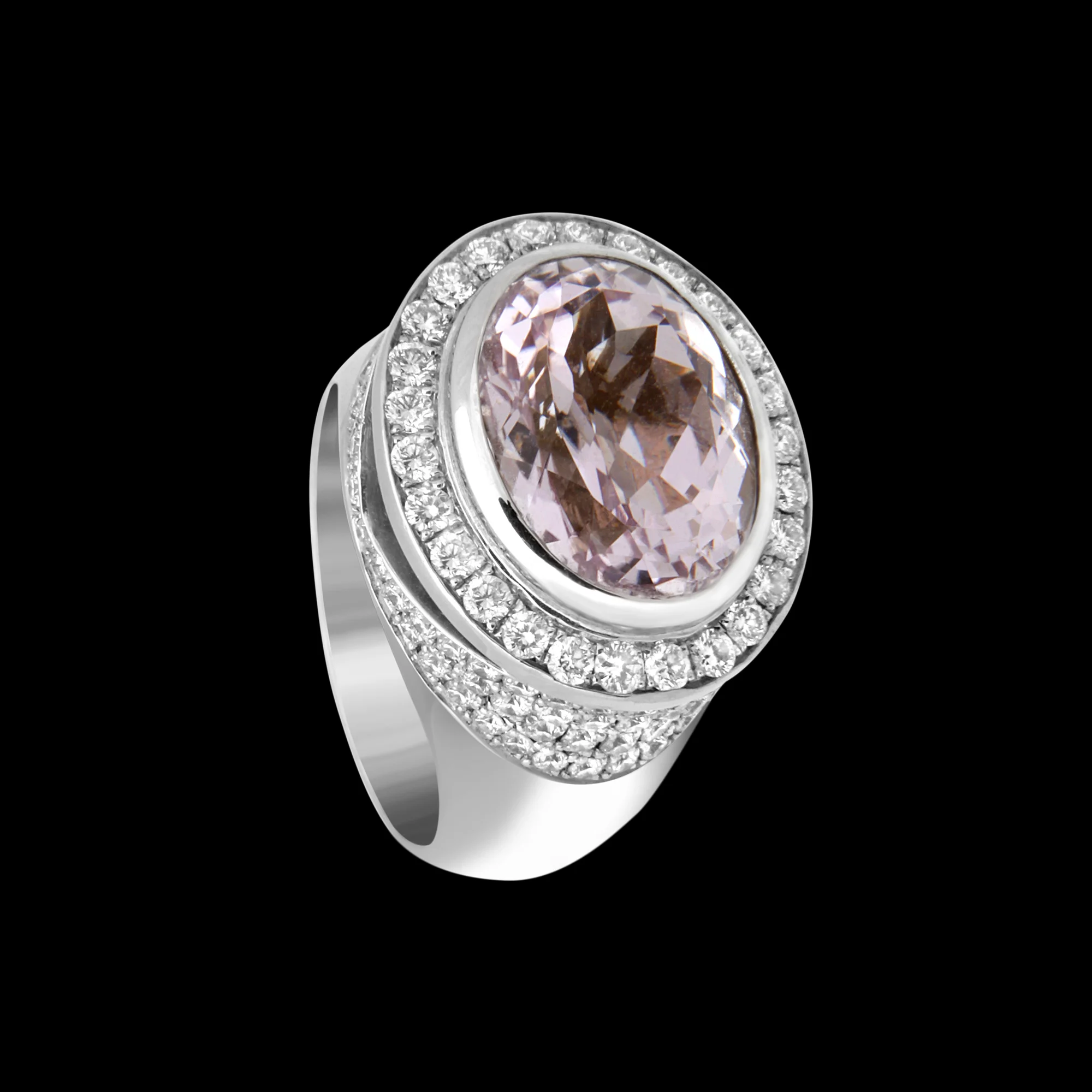 FRIDA | Fine Jewellery. Engagement. Signature design 18kt white gold ring set with a kunzite and diamonds. View1.