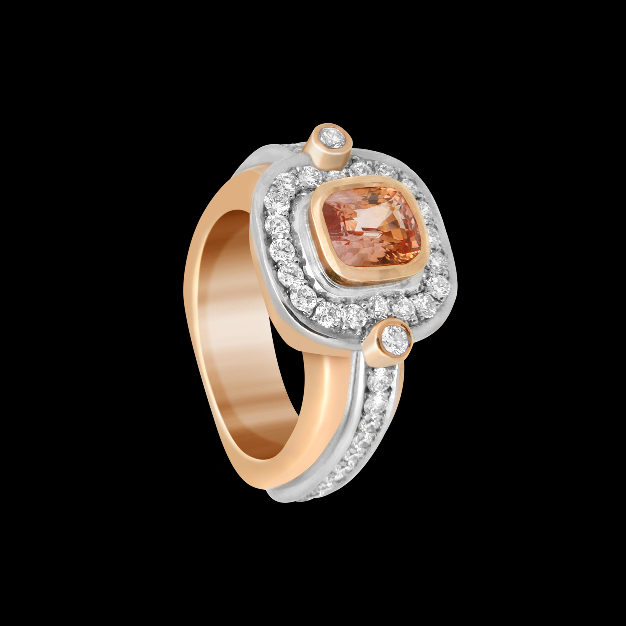 FRIDA | Fine Jewellery. Custom designed 18kt pink and white gold ring set with a peach sapphire and diamonds. View1.