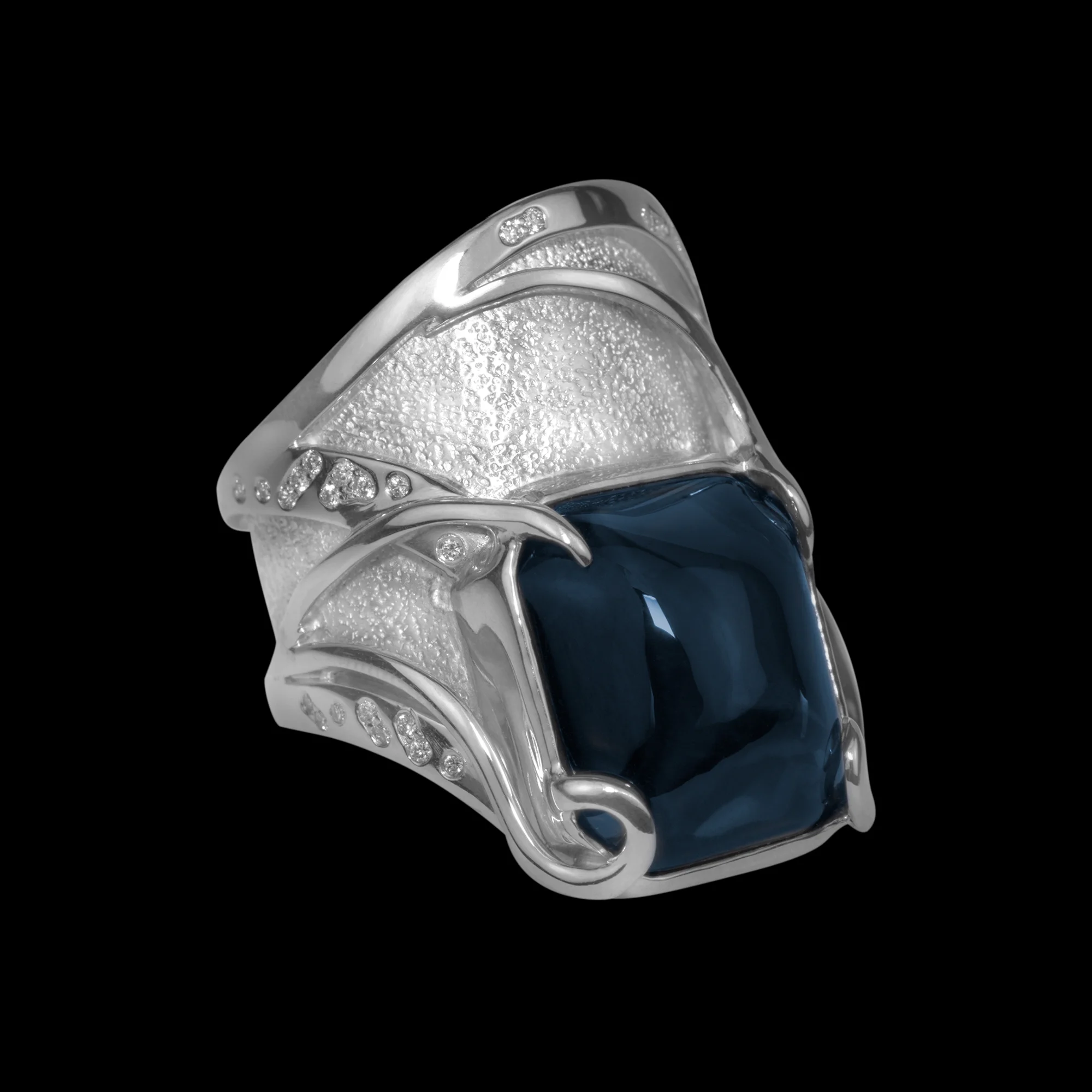 FRIDA | Fine Jewellery. Shield™ Collection, Tempest ring. One-of-a-kind ring in sterling silver and 18kt white gold set with a cabochon-cut spinel and brilliant-cut diamonds. View 3.jpg